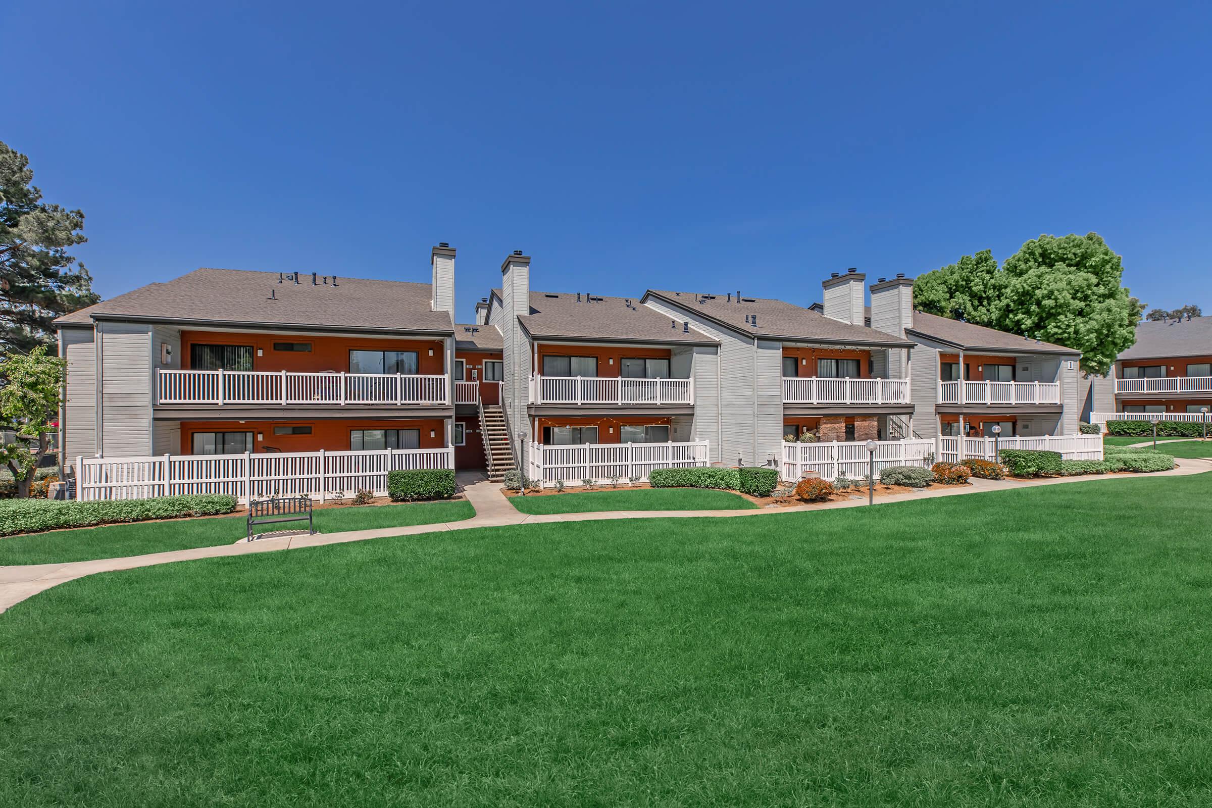 a large lawn in front of a building