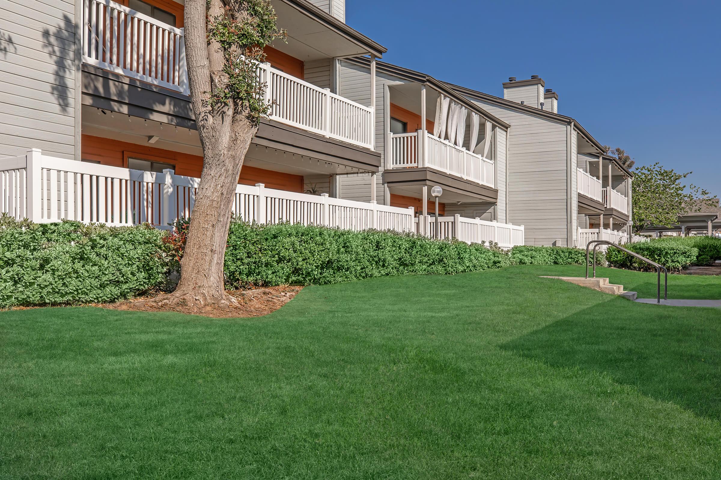 a large lawn in front of a building