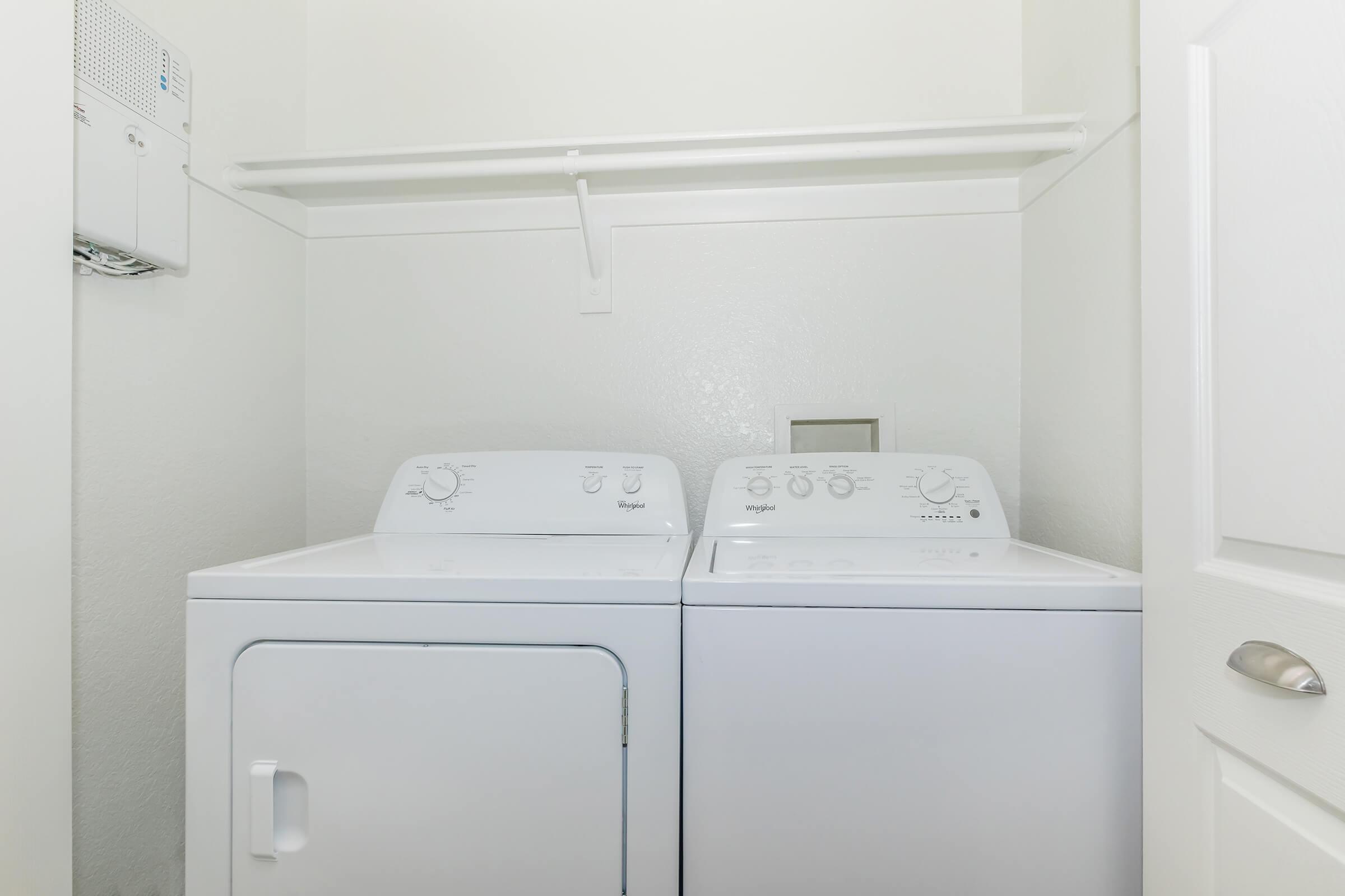 a stove top oven sitting inside of a refrigerator