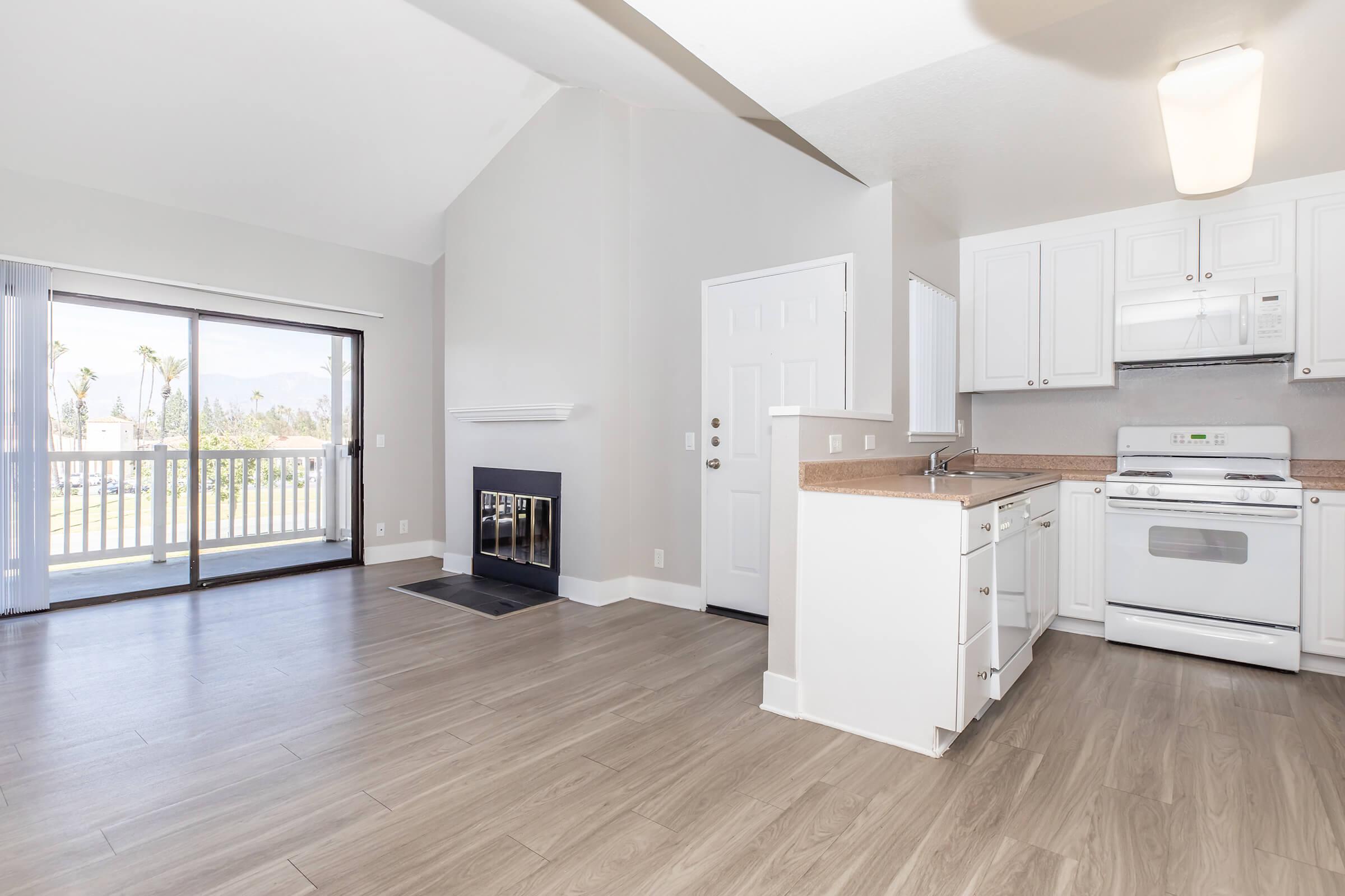 a kitchen with a wood floor