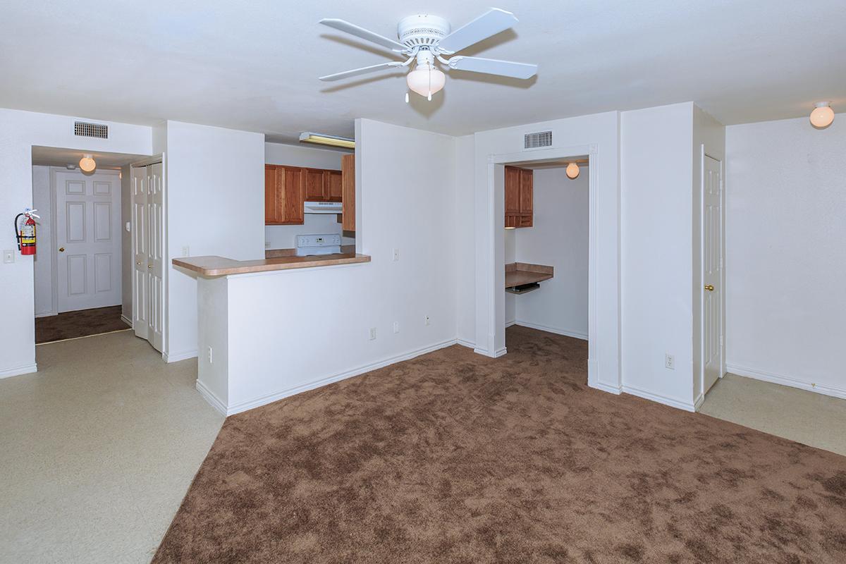 a room filled with furniture and a flat screen tv