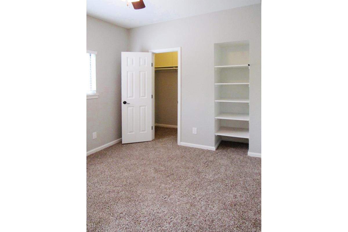 a white refrigerator freezer sitting inside of a building