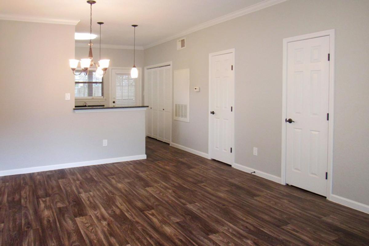 a kitchen with a wood floor