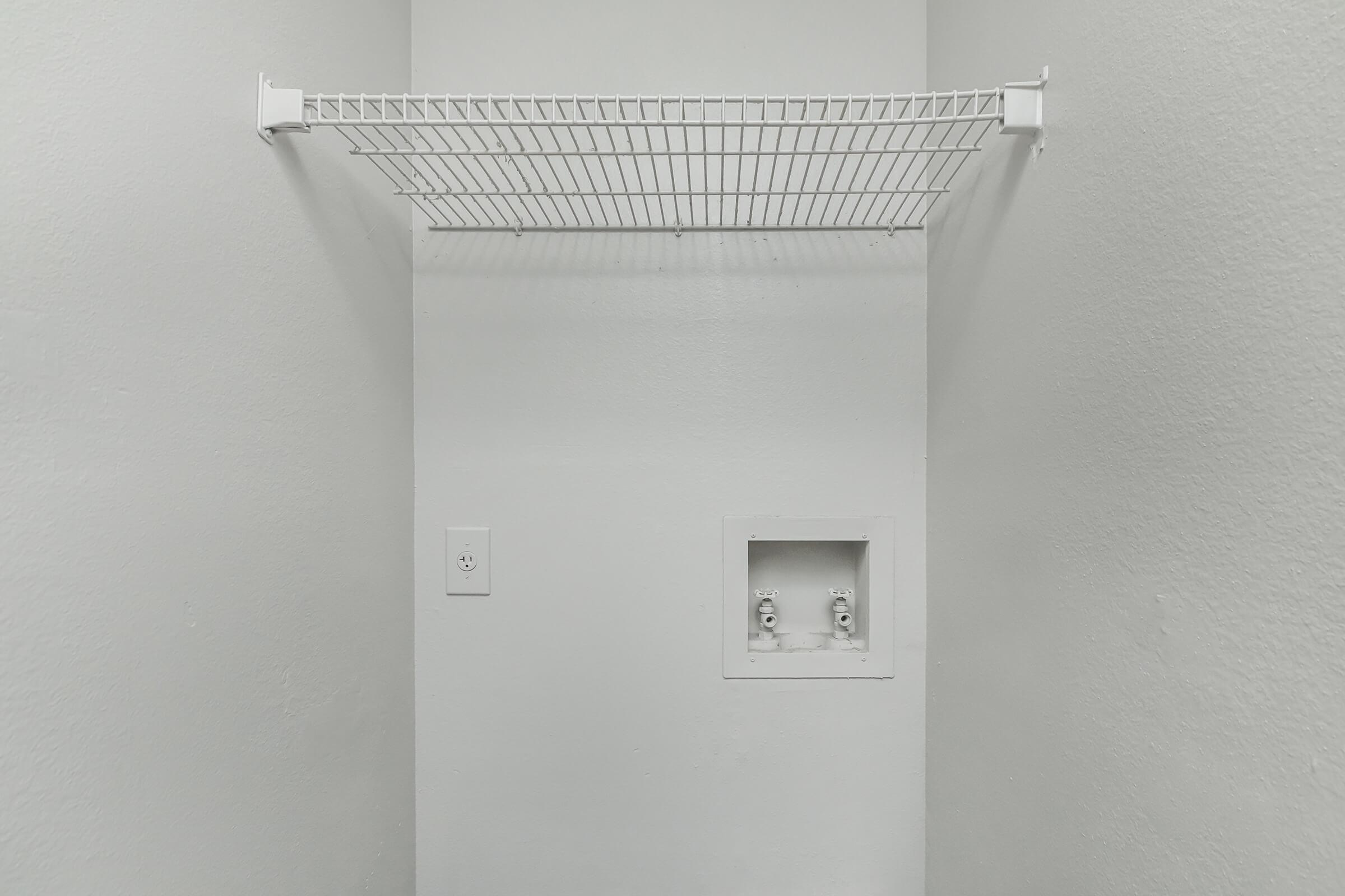 a white refrigerator freezer sitting in a room