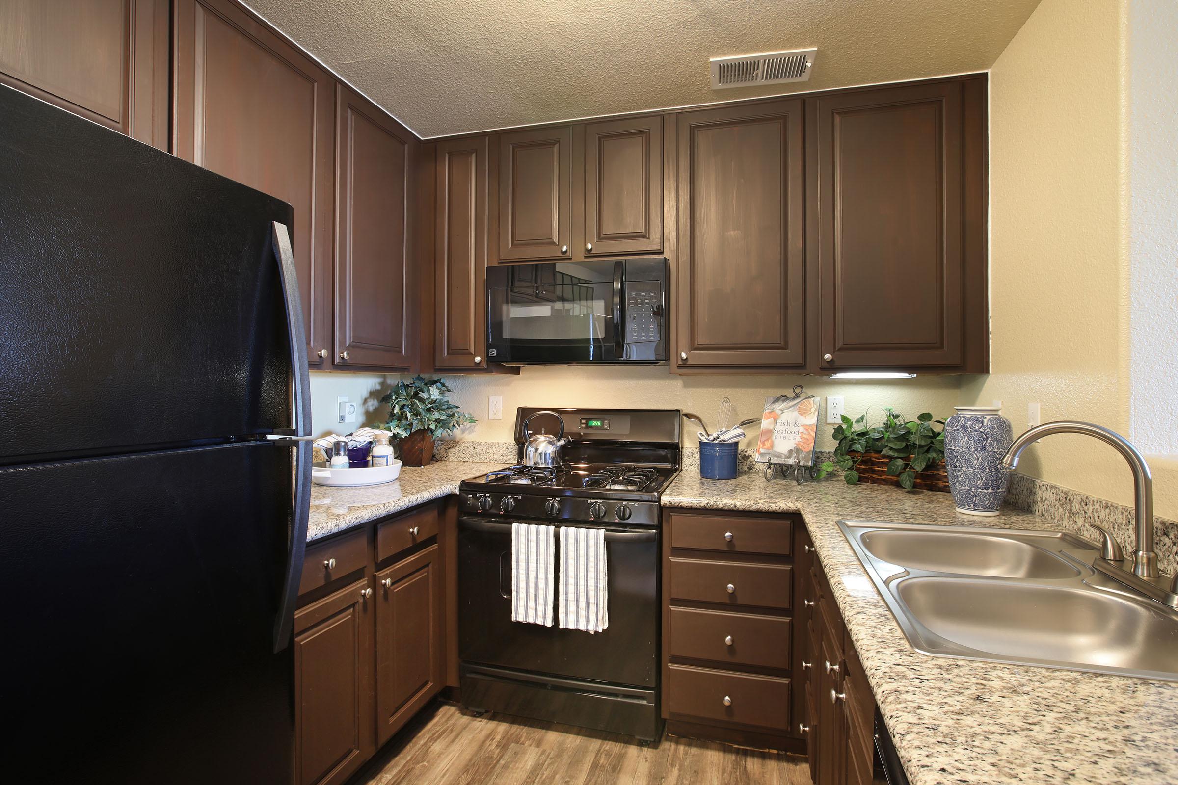 a modern kitchen with stainless steel appliances