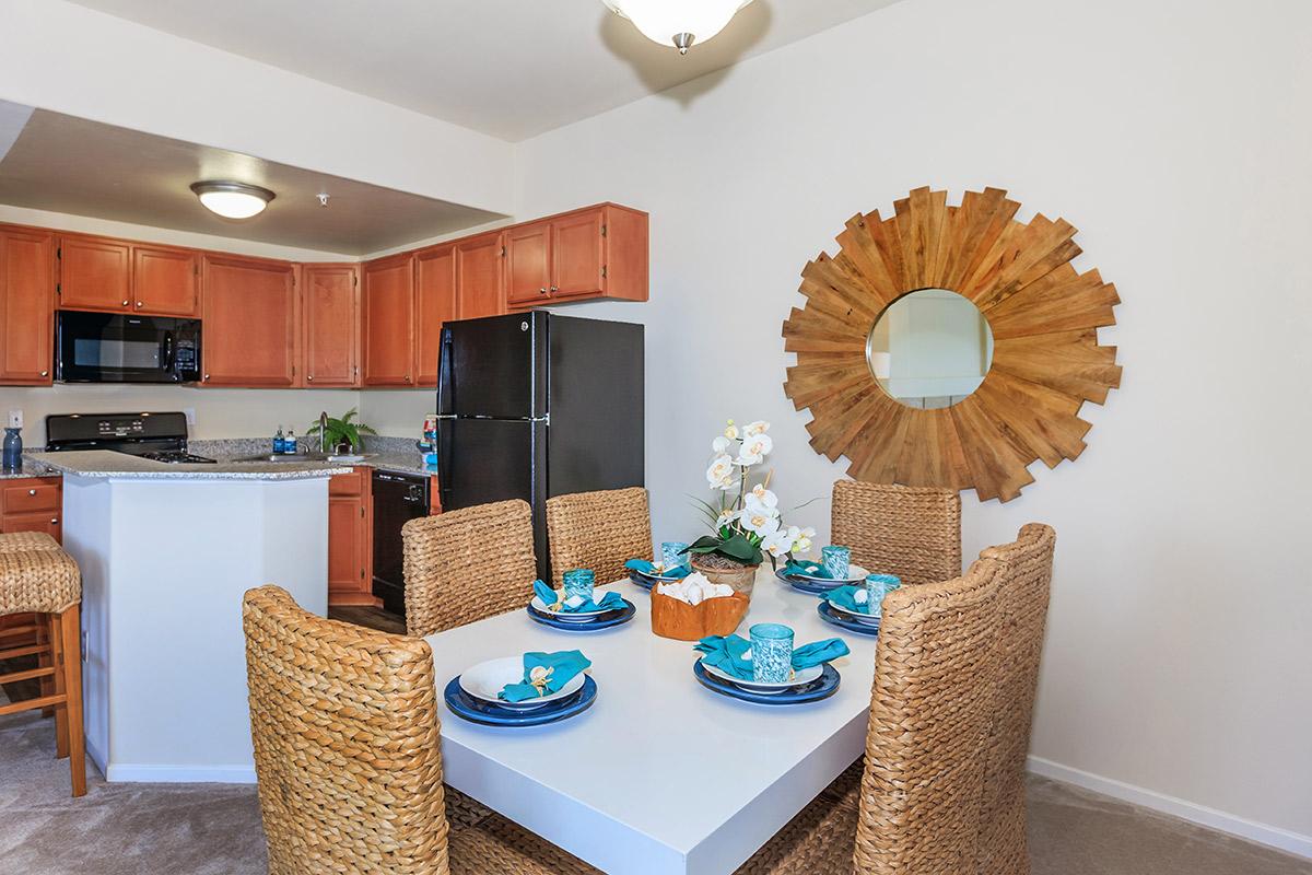 a kitchen filled with lots of furniture