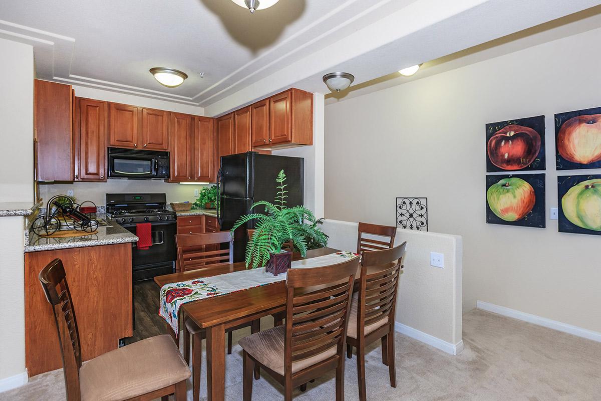 a kitchen with a dining table