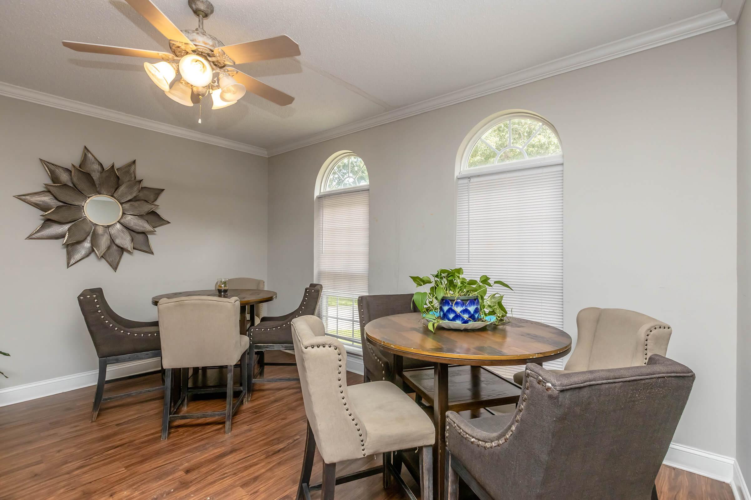 a room filled with furniture and a table