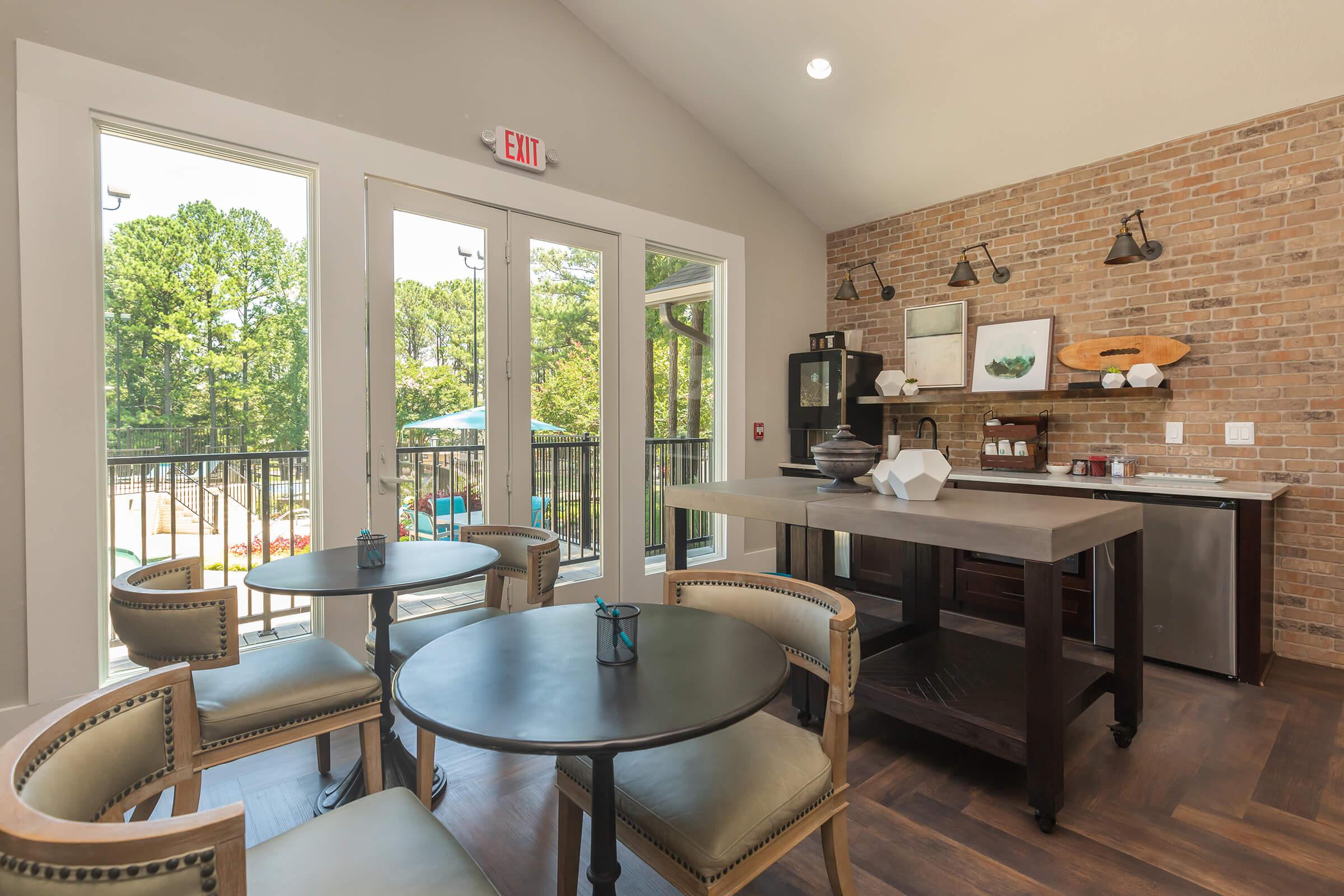 Relax in The Clubhouse at Madison Landing at Research Park Apartments in Madison, AL