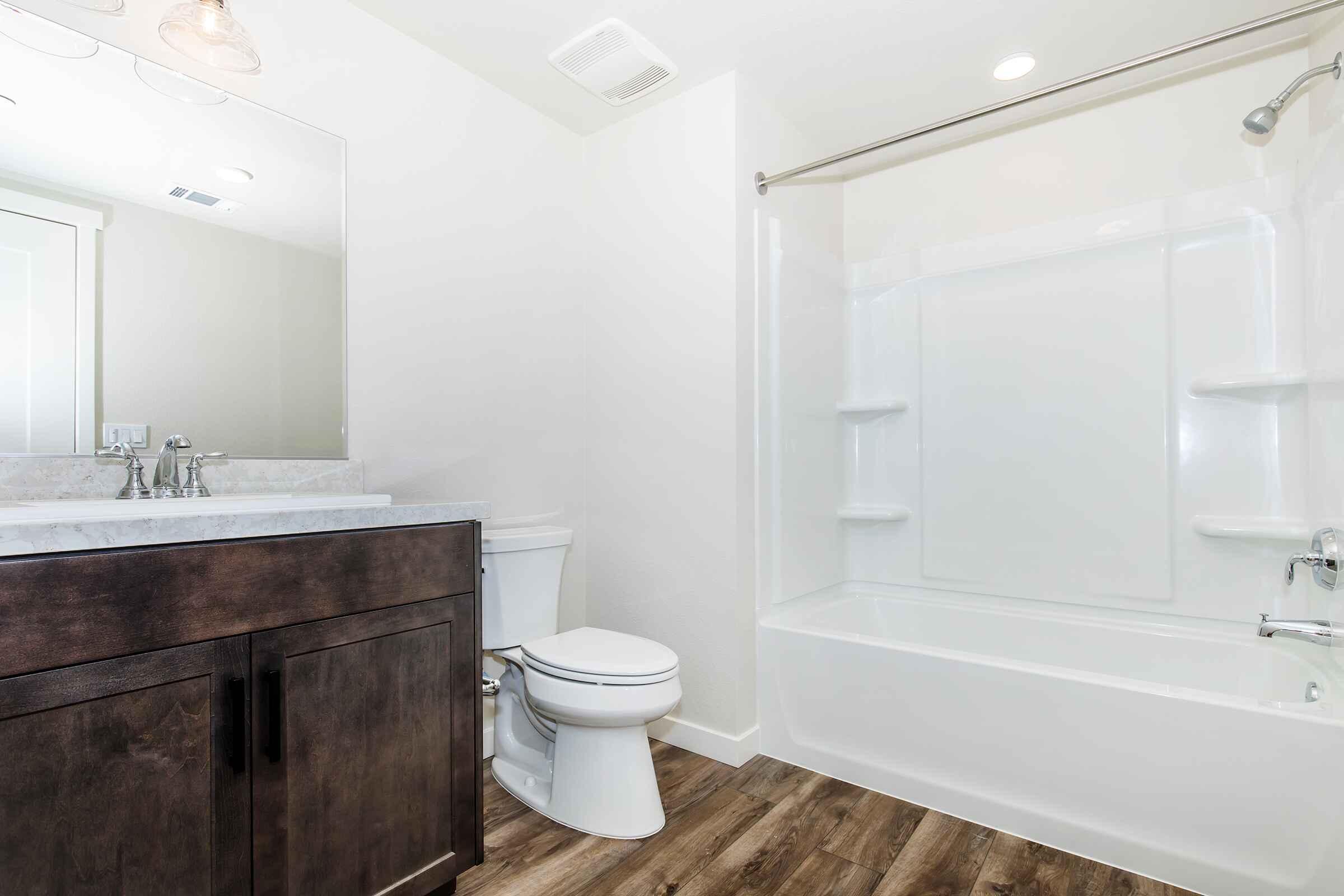 a room with a sink and a bath tub