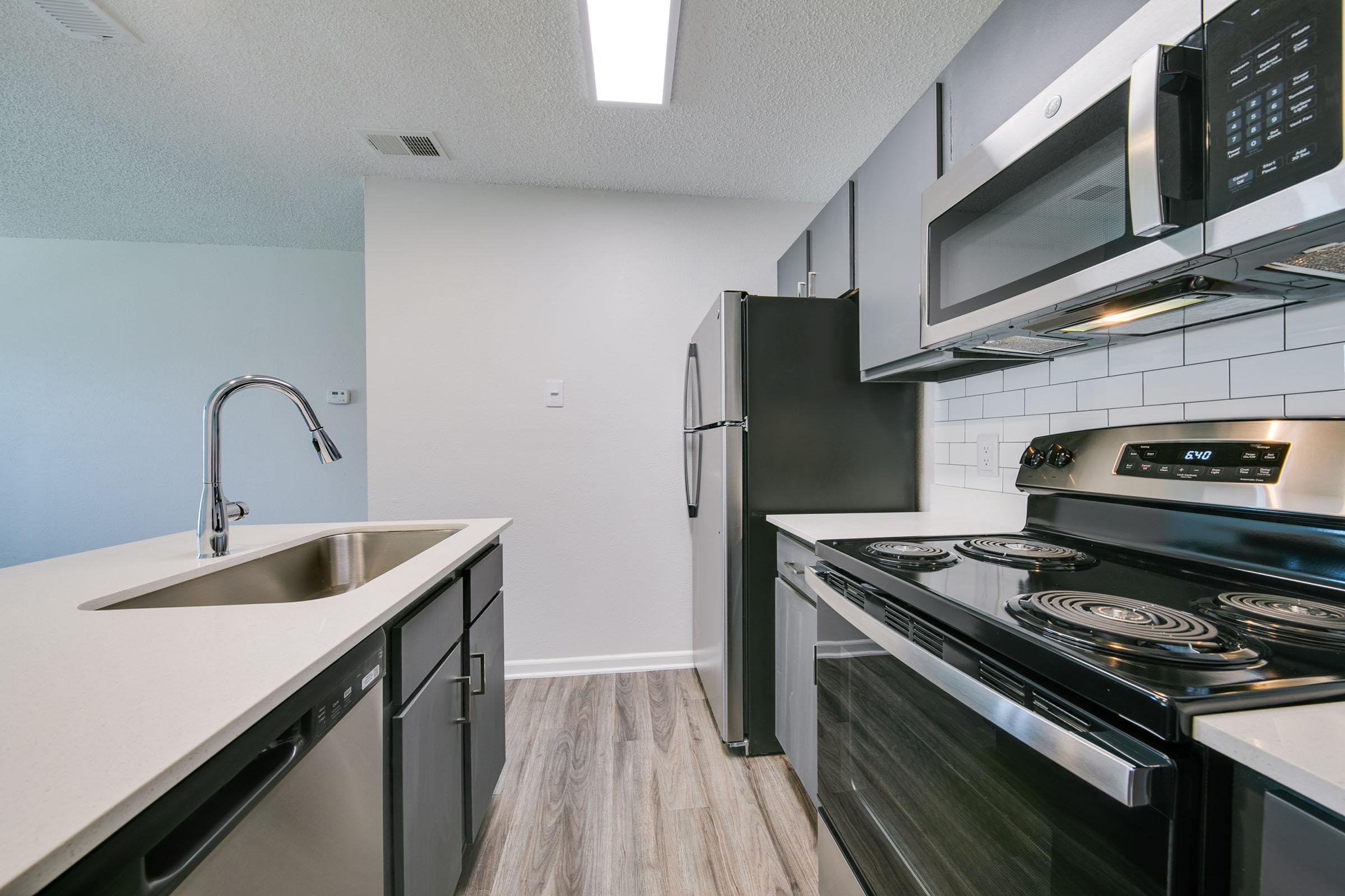 FULLY EQUIPPED KITCHEN AT FOREST RIDGE APARTMENTS FOR RENT
