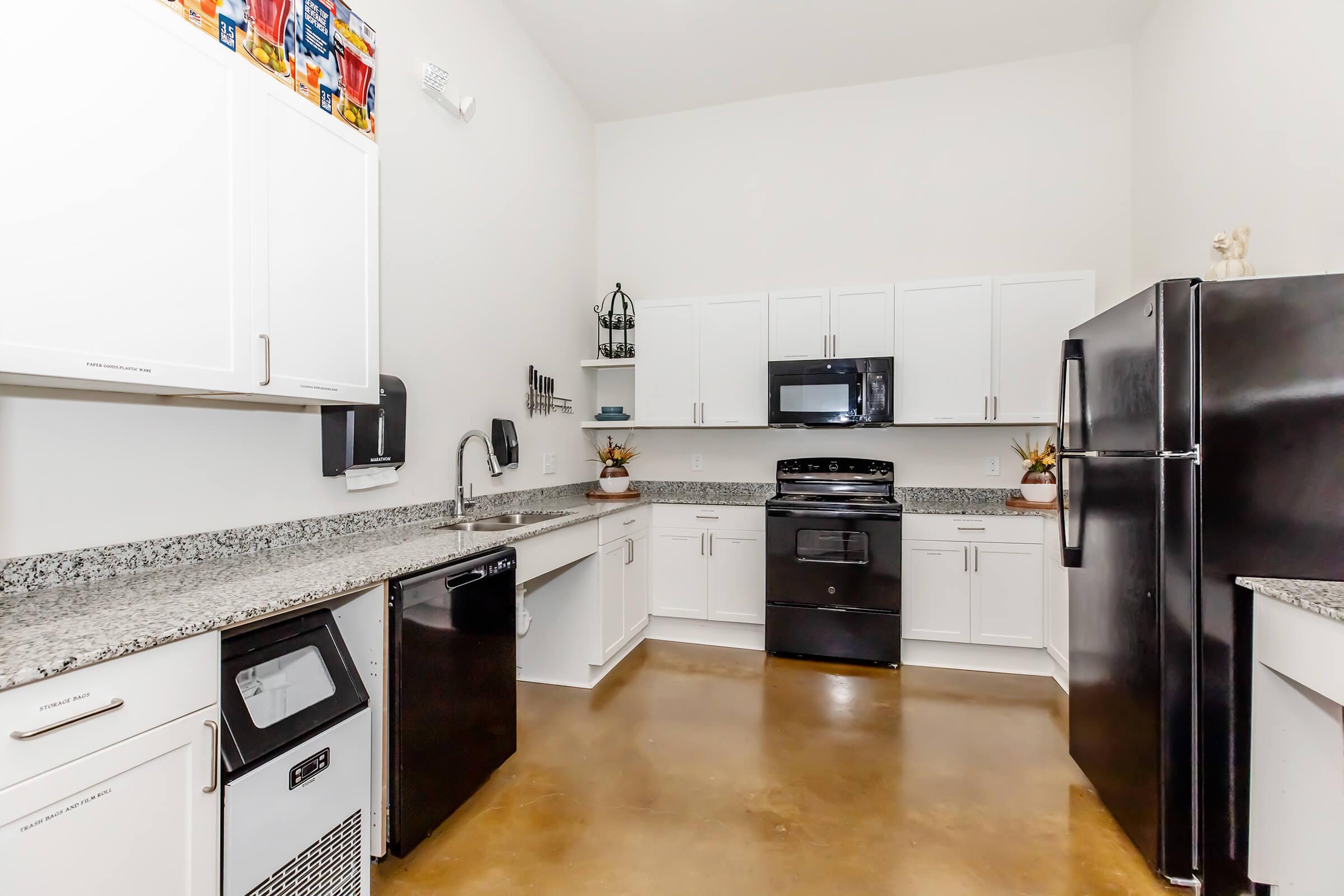 a stainless steel refrigerator in a kitchen