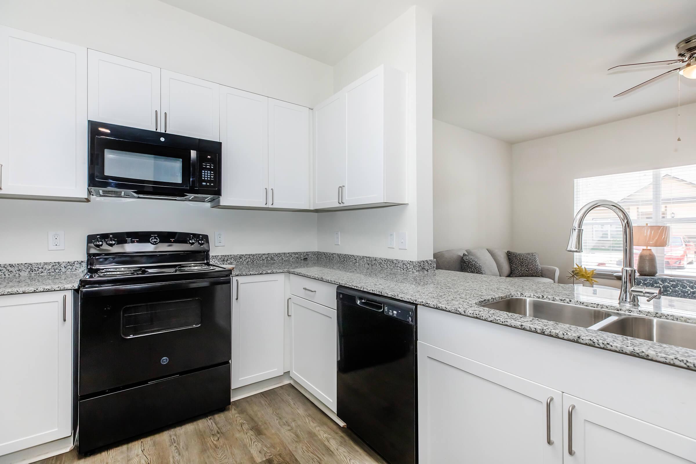 a modern kitchen with stainless steel appliances