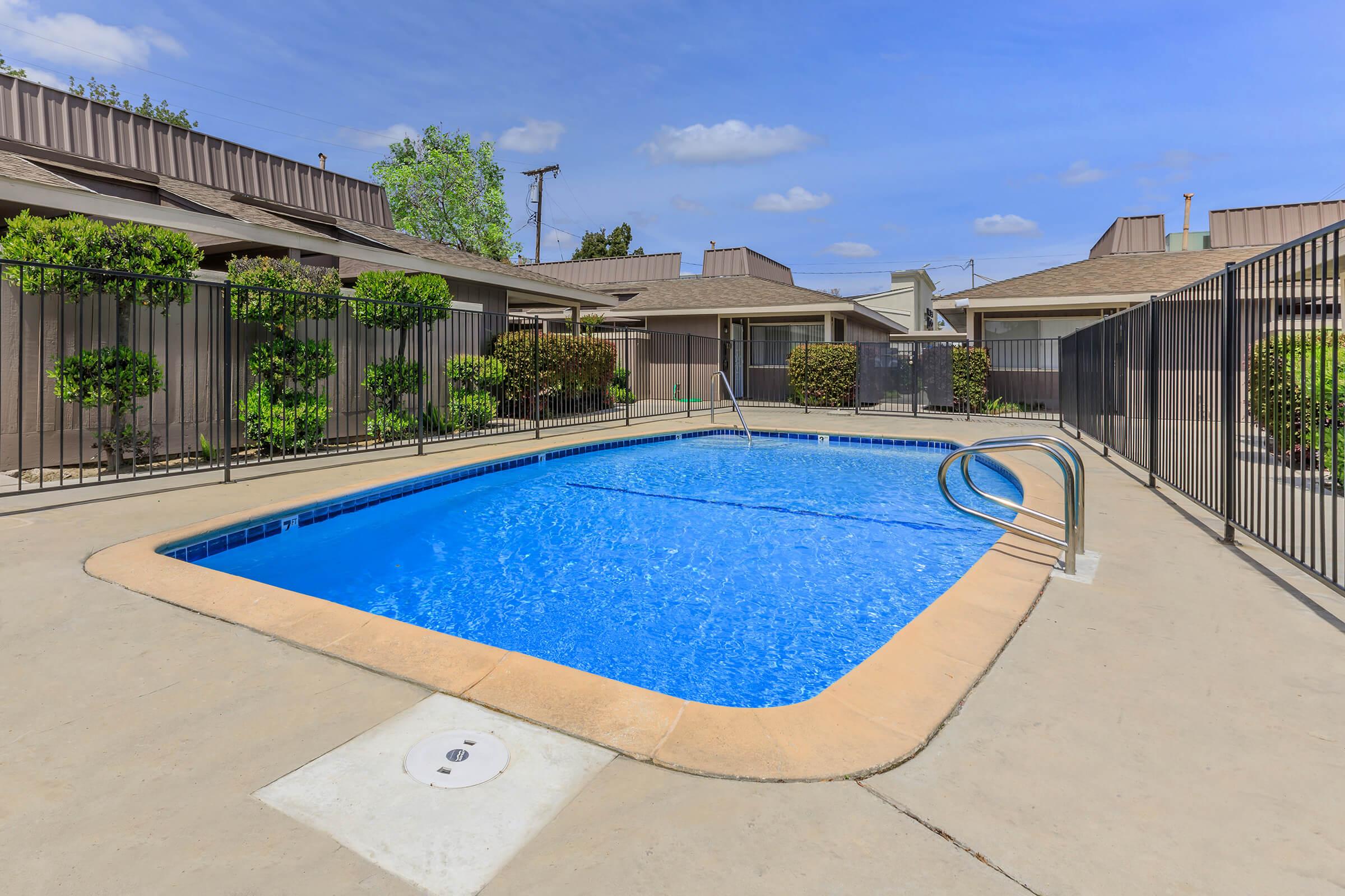 a pool next to a building