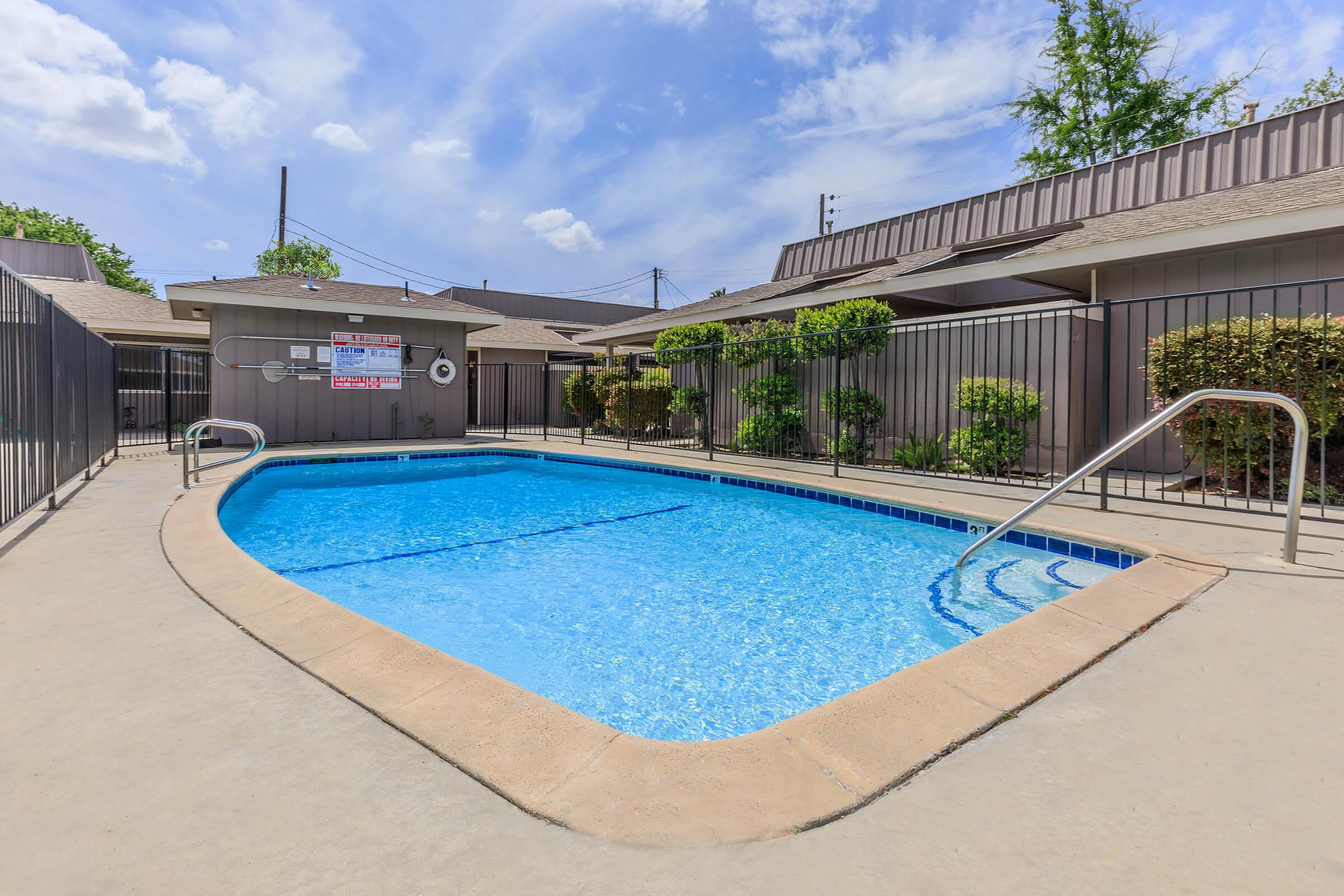 a pool next to a building