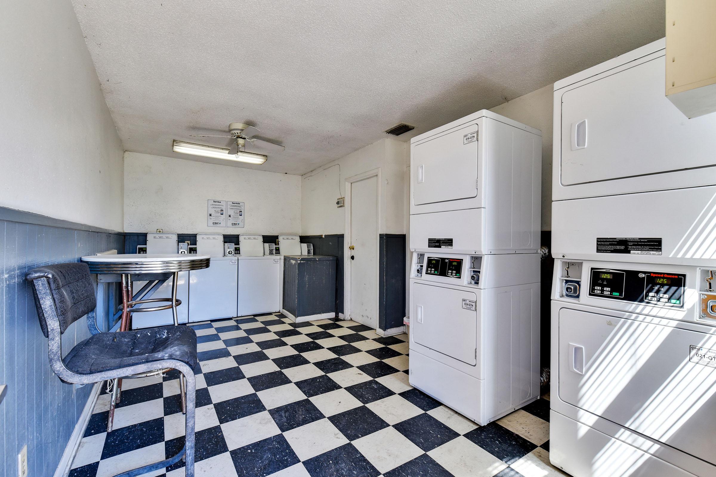 a kitchen with a tiled floor