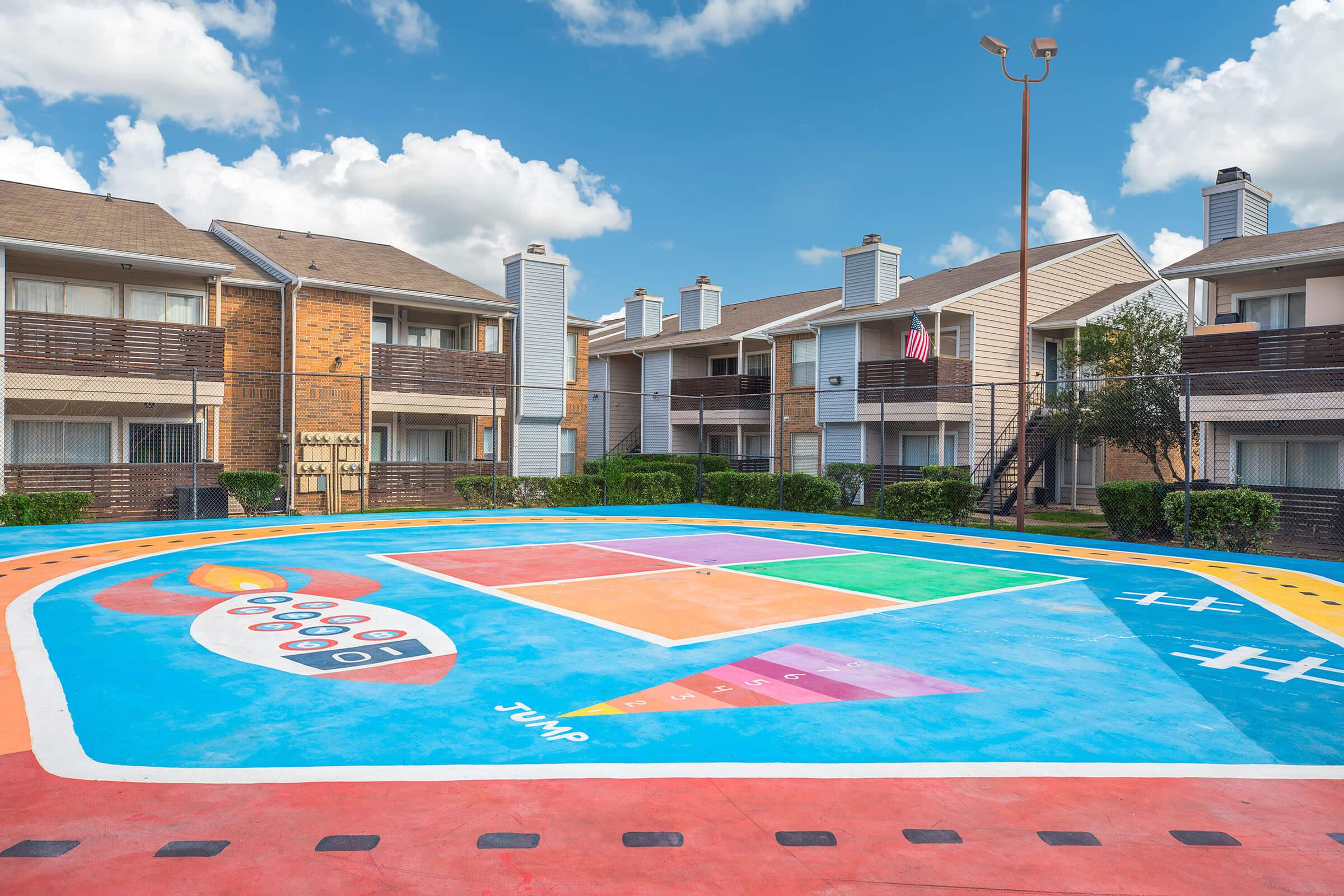 a building with graffiti on the side of the pool