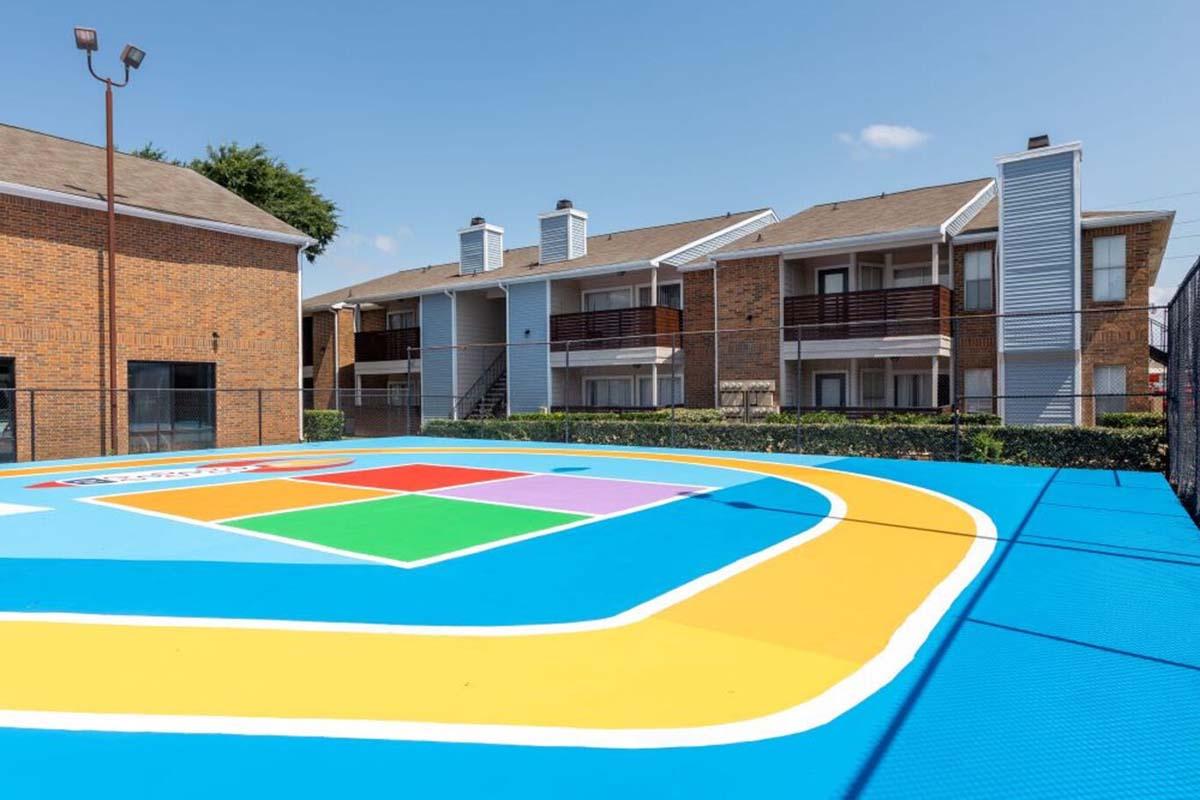 a house with a pool in front of a building