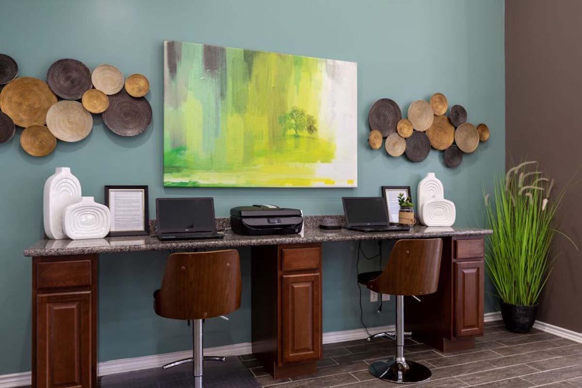 a room filled with furniture and vase on a table