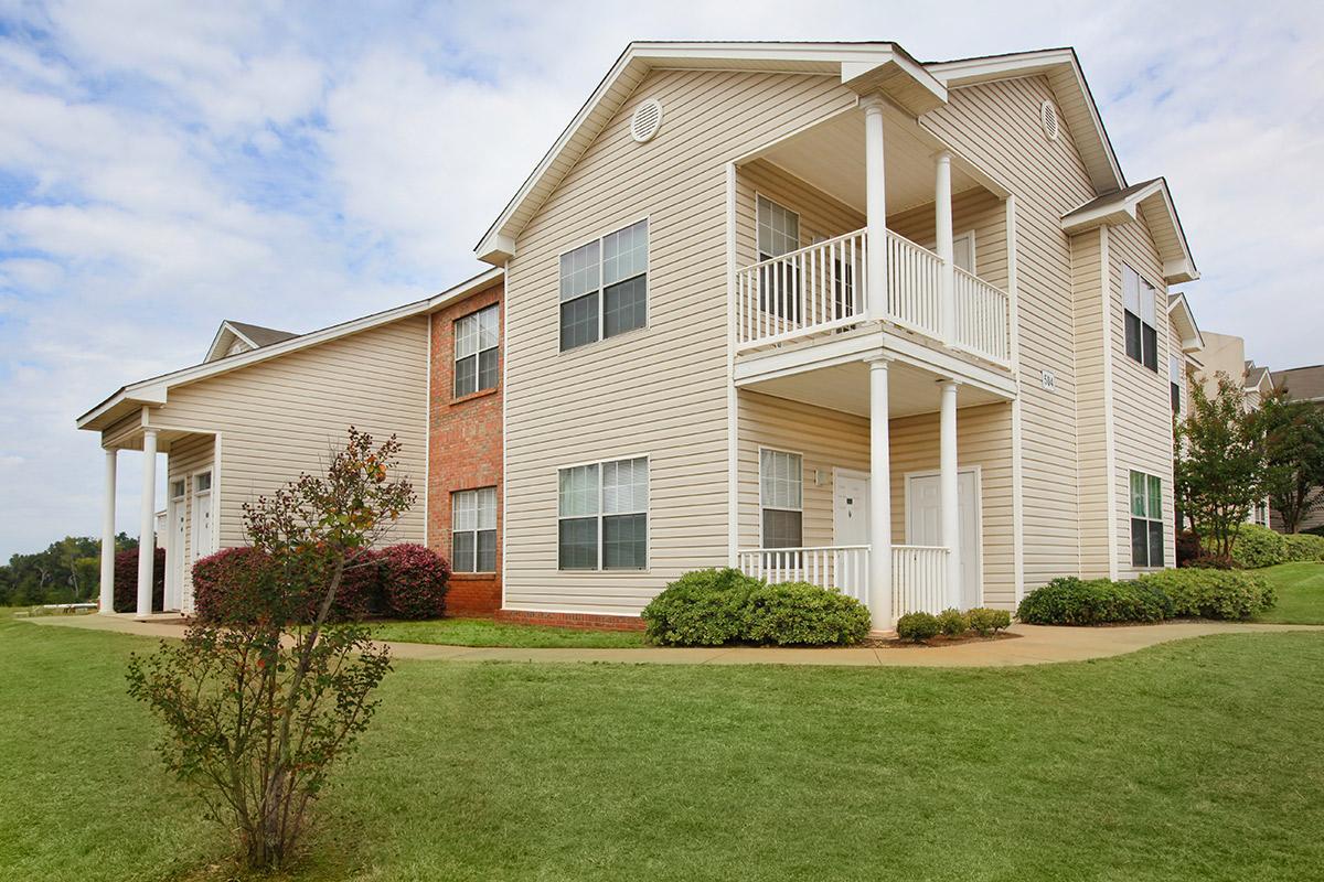 a large lawn in front of a house