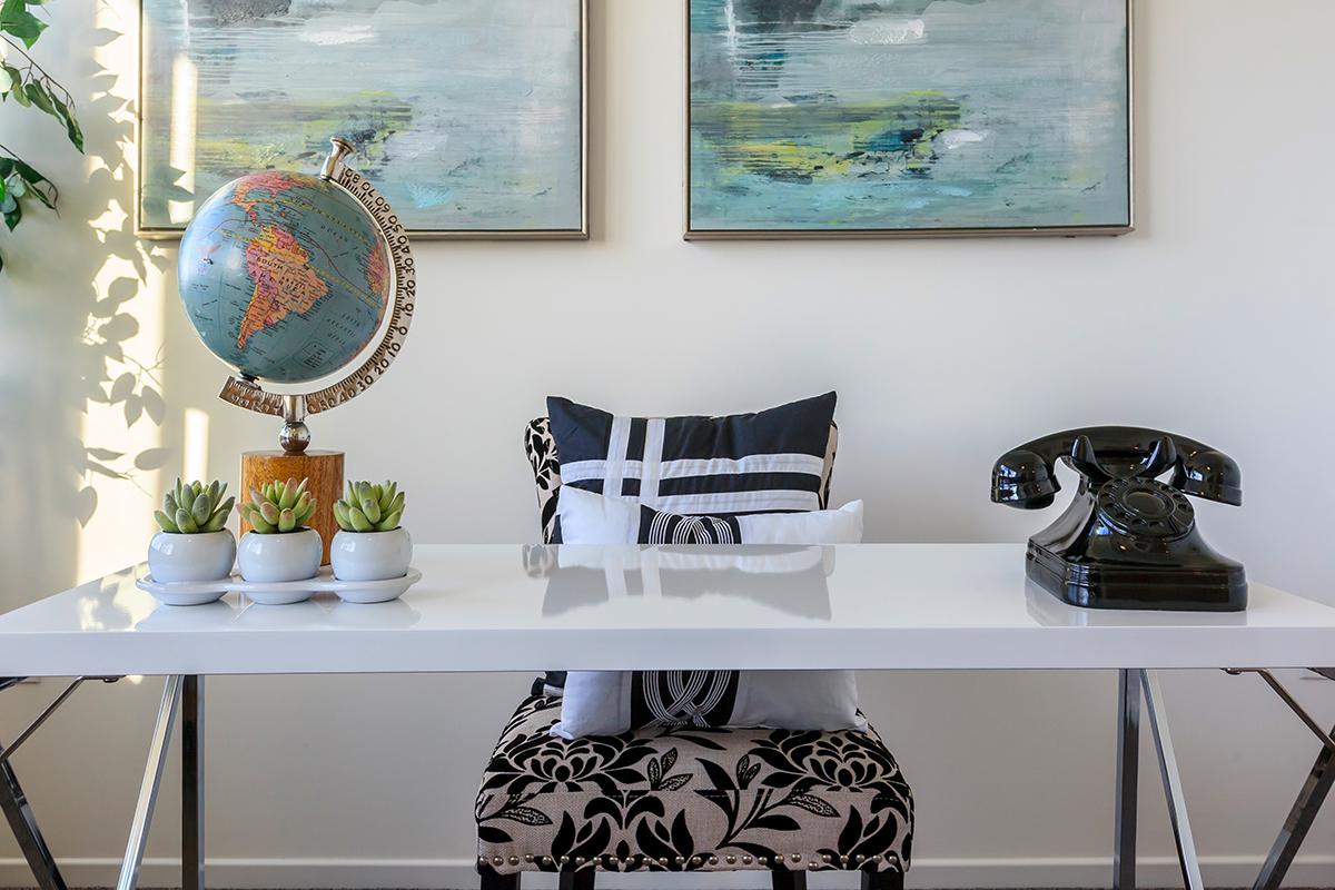 a table topped with lots of furniture