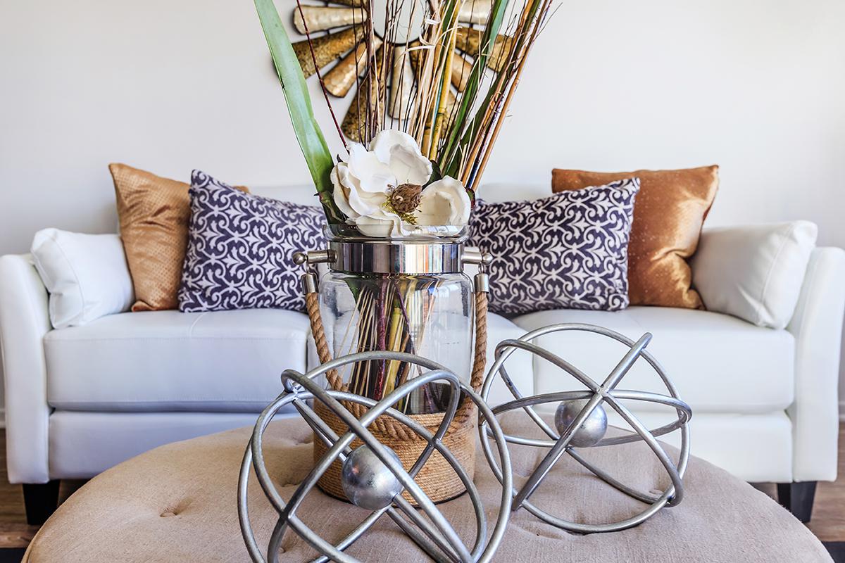 a living room with a leather chair