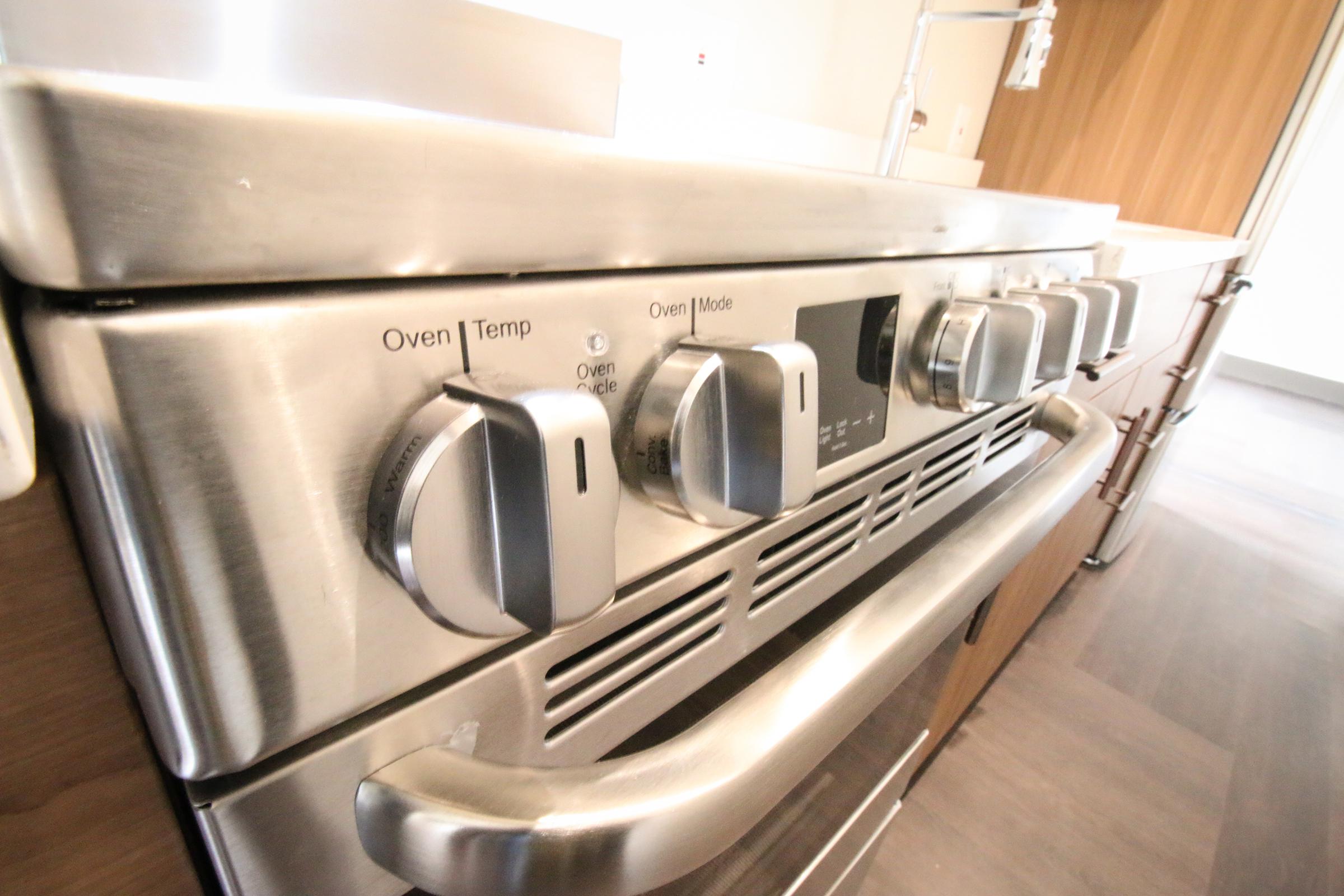 a toaster oven sitting on top of a stove