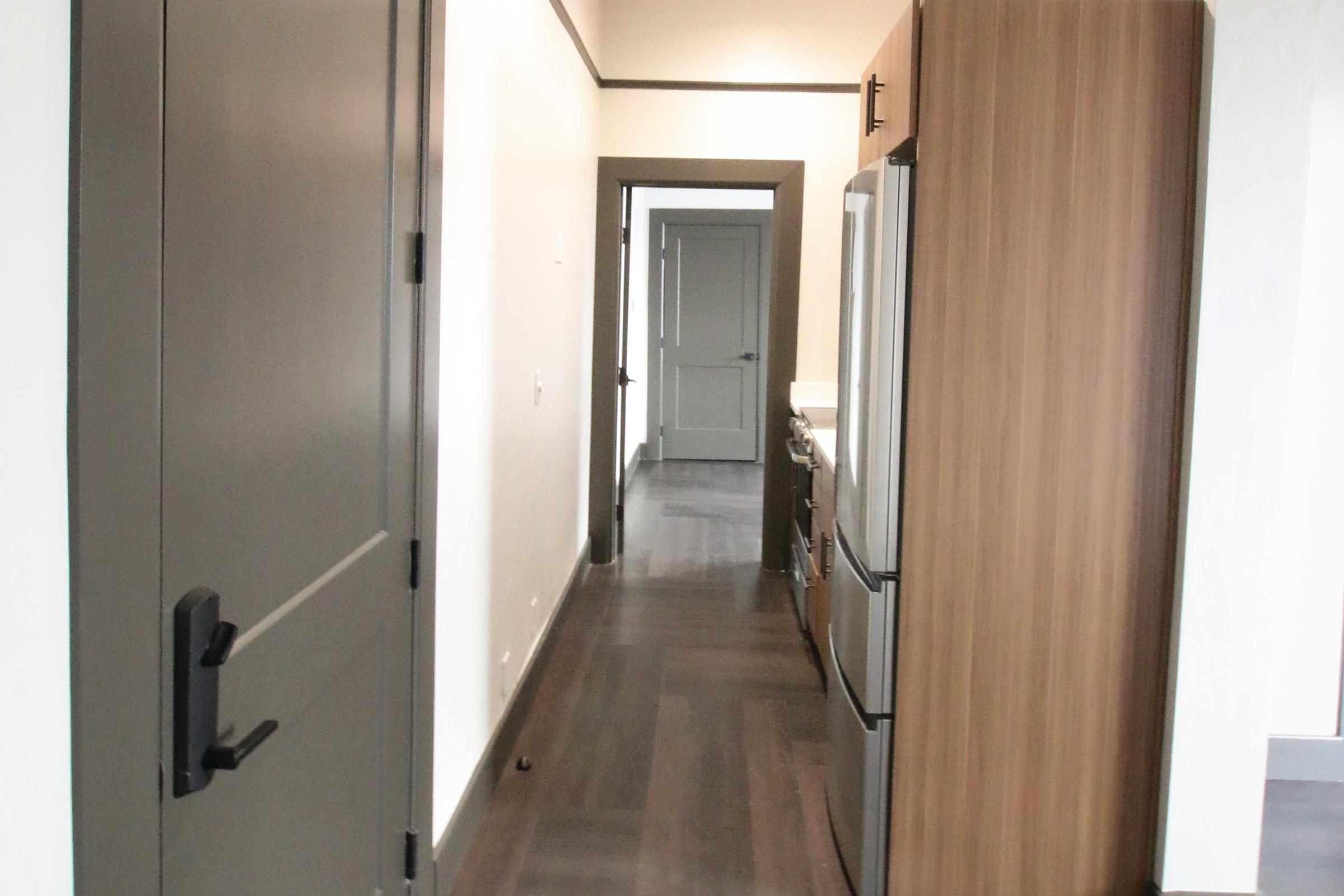 a stainless steel refrigerator in a room