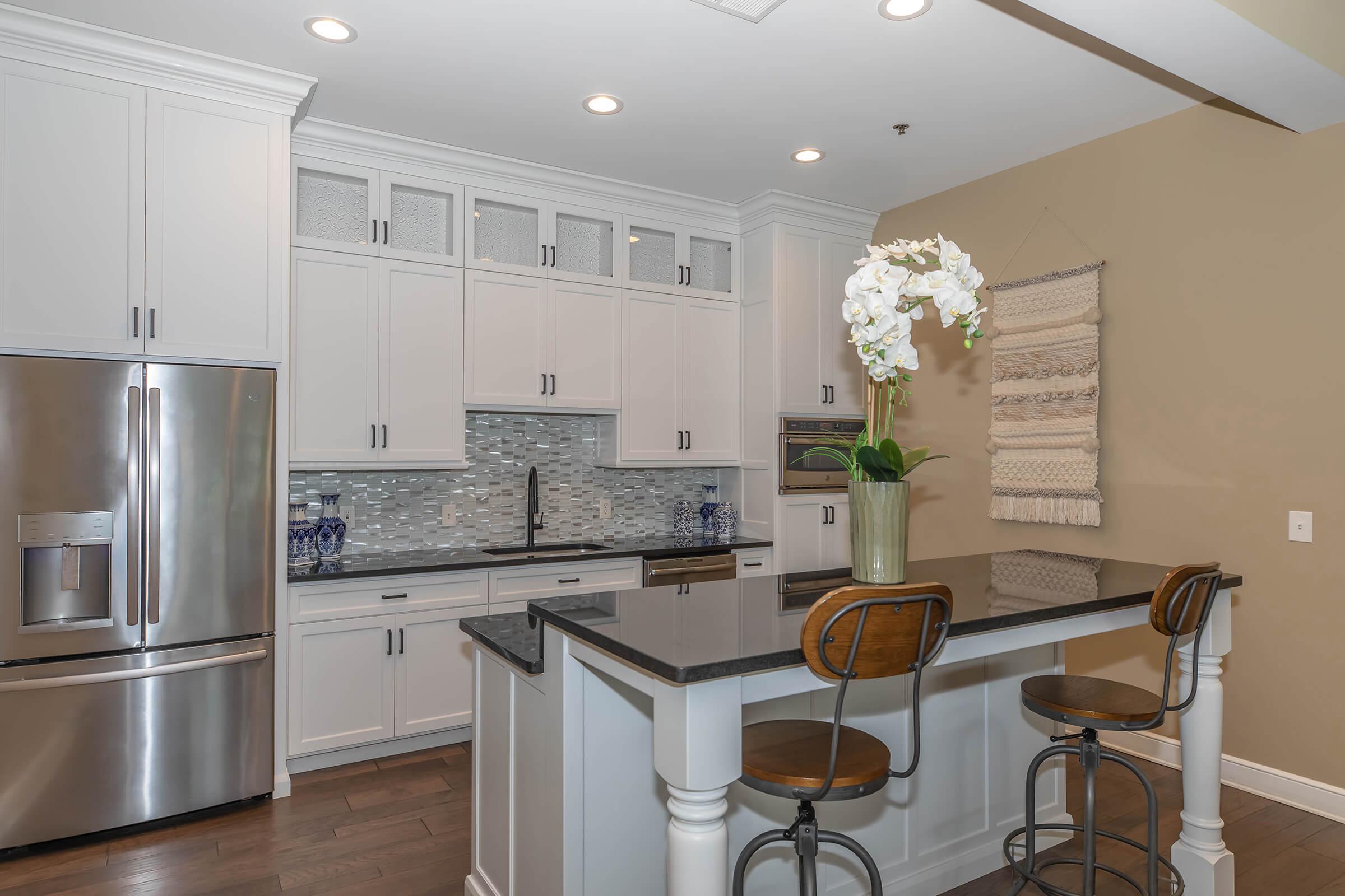 a kitchen with a dining room table