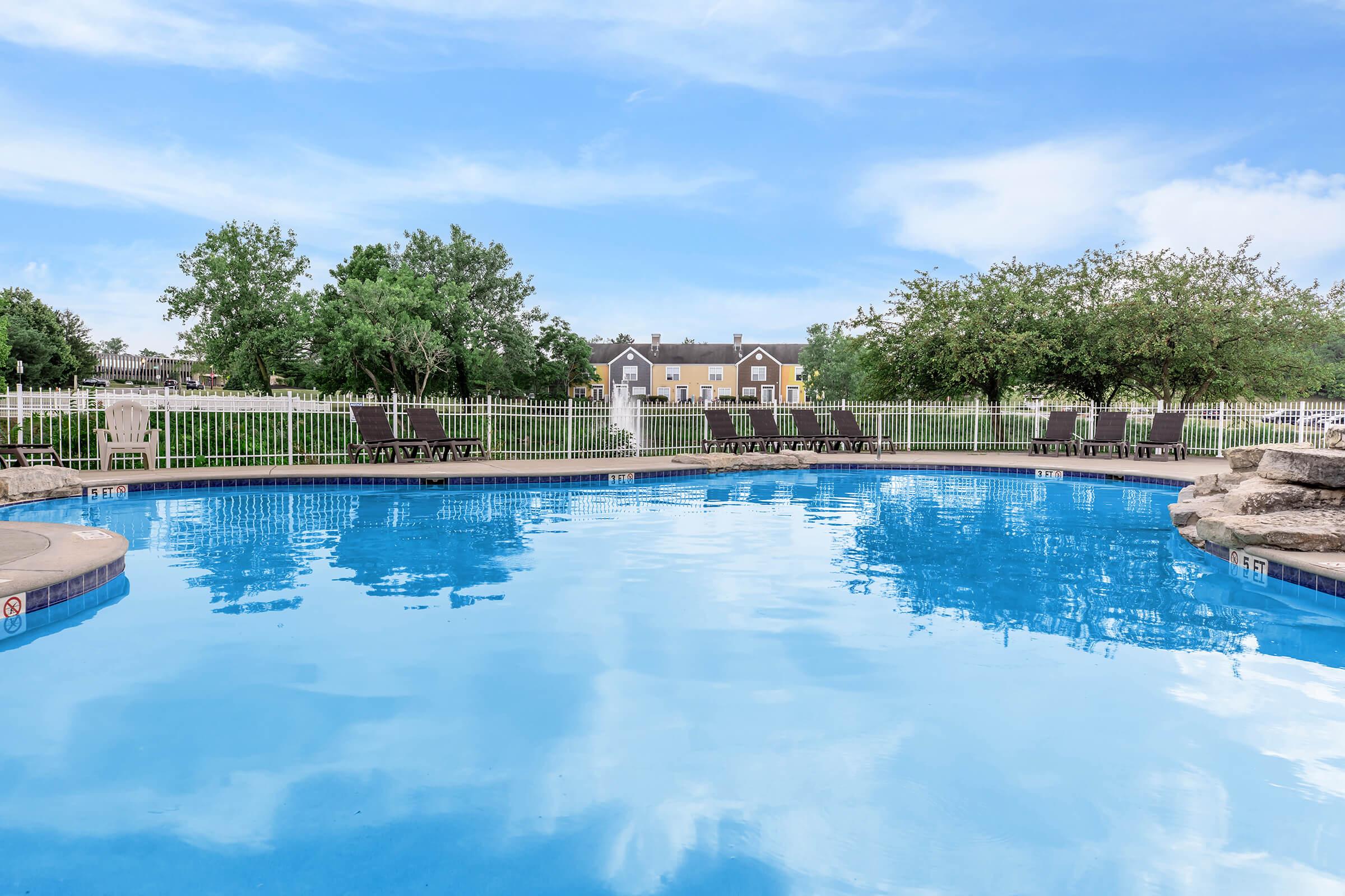 a pool next to a body of water