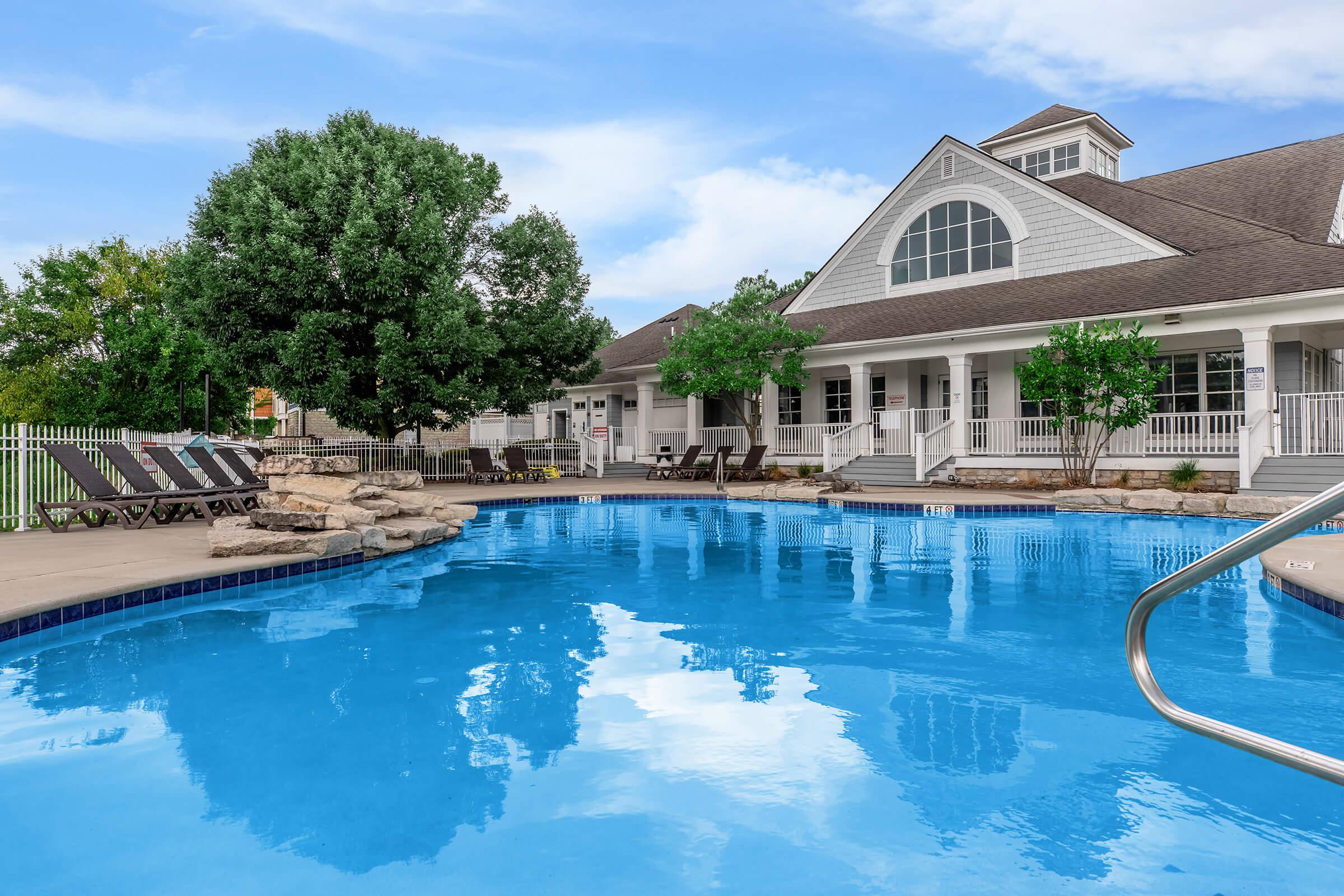 a pool next to a body of water