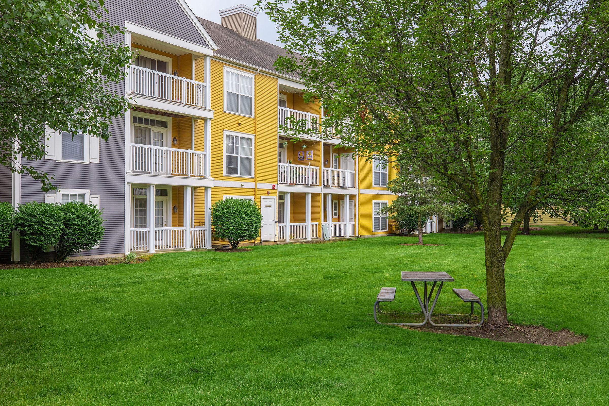 a large lawn in front of a house