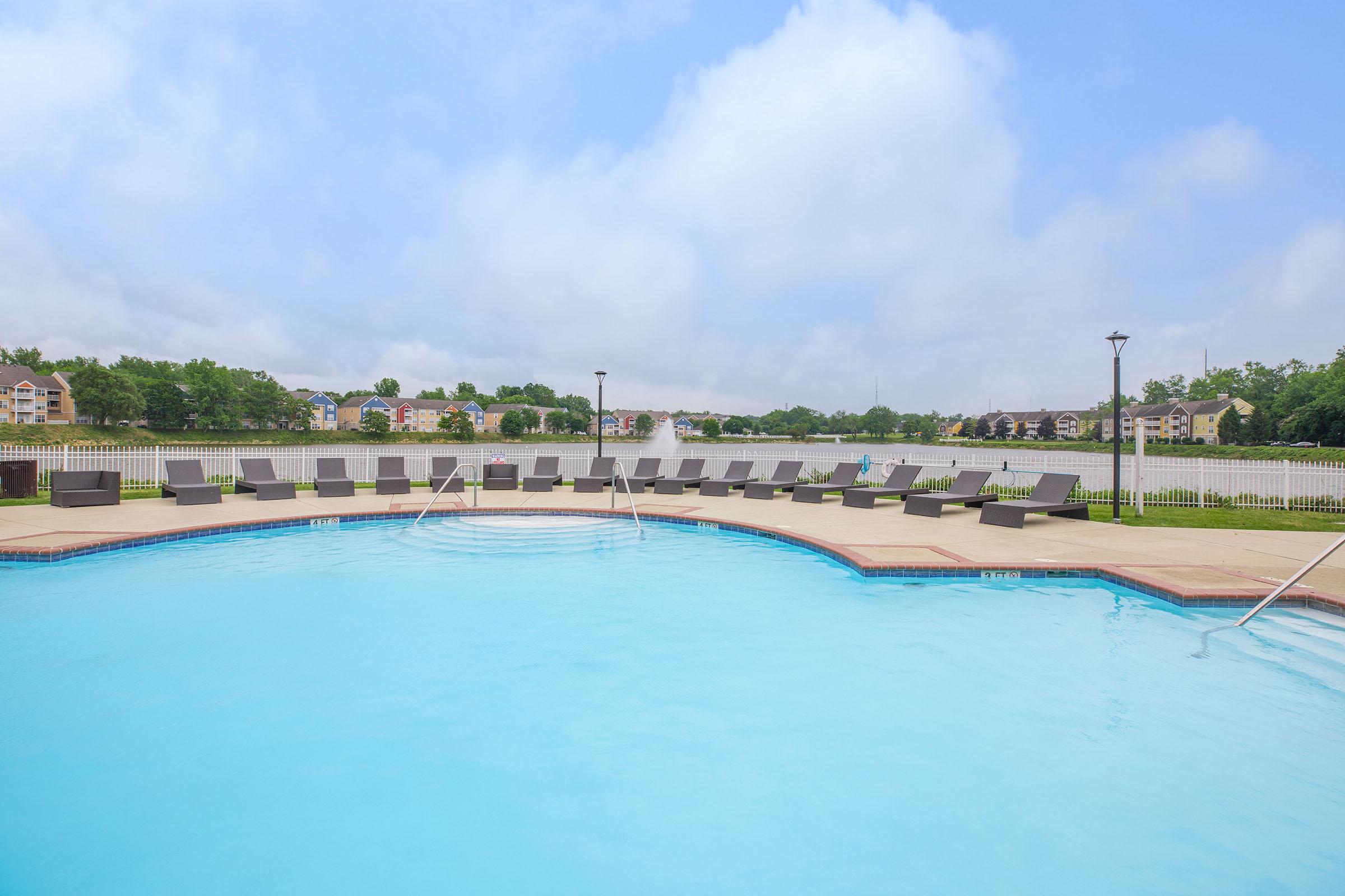 a pool next to a body of water