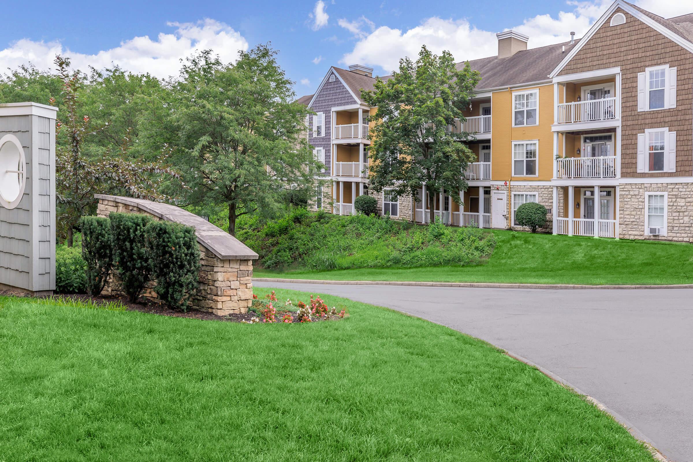 a large lawn in front of a house