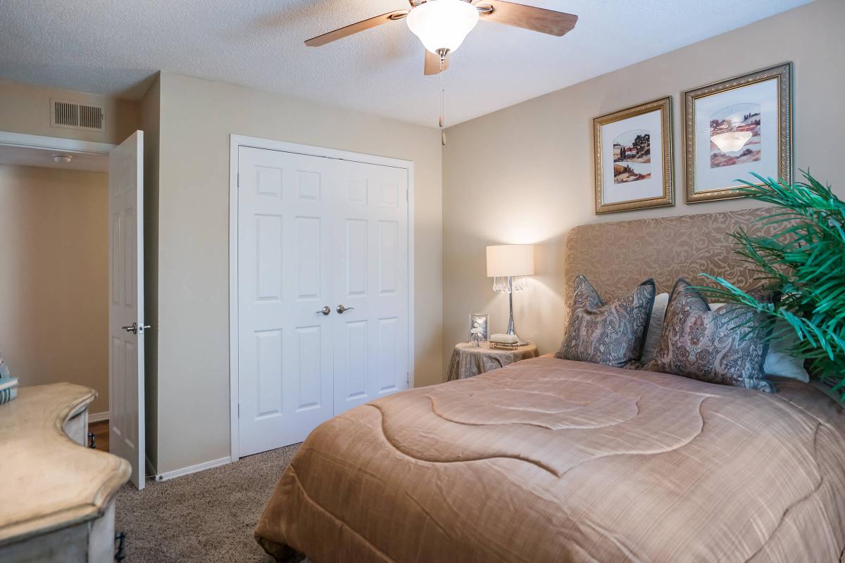 Bedroom with Lighted Ceiling Fan
