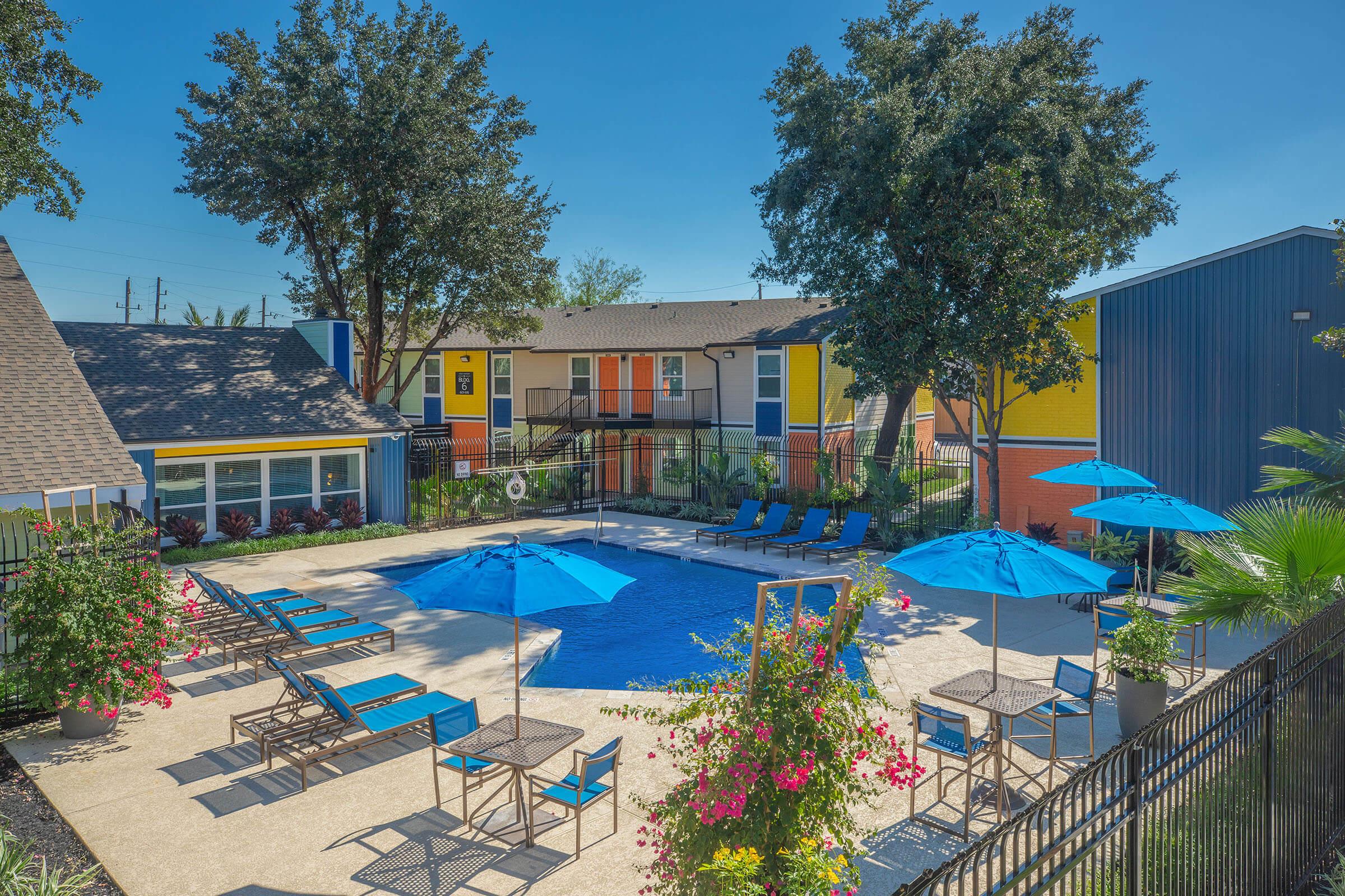 a house with a pool in a garden