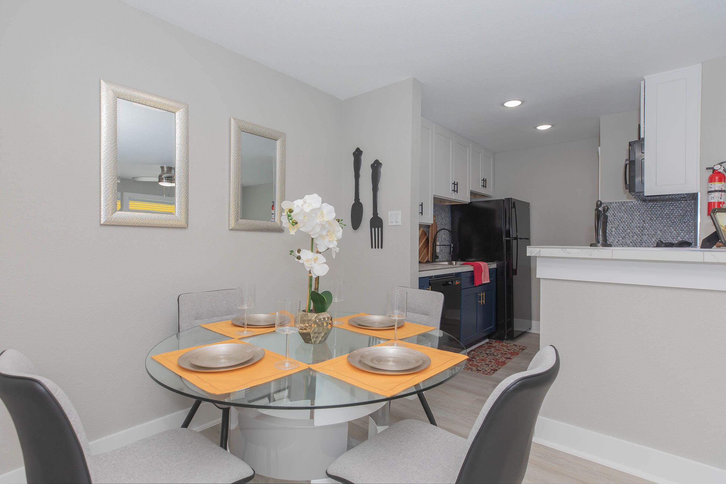 a kitchen with a table in a room