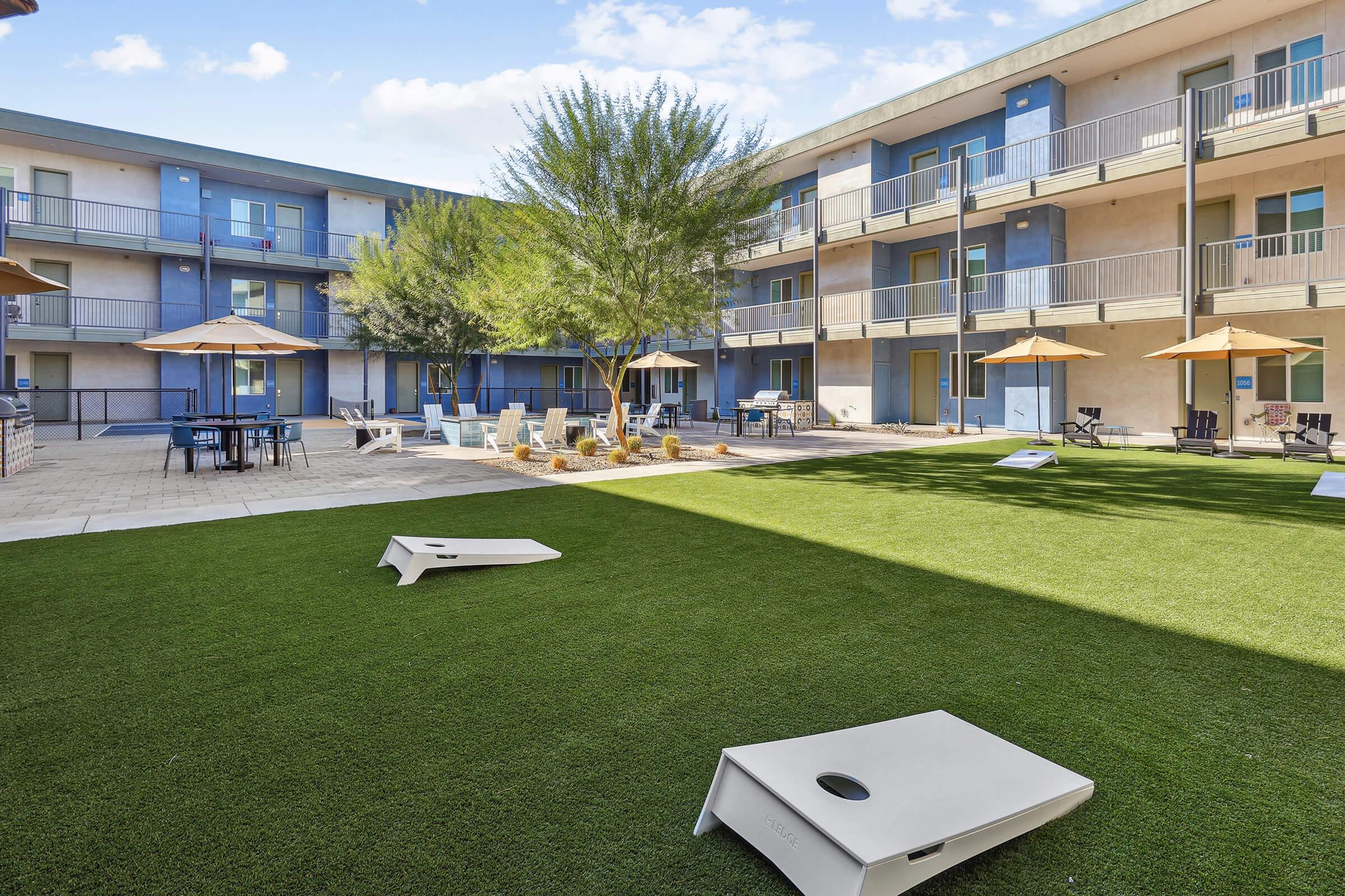 a large lawn in front of a building