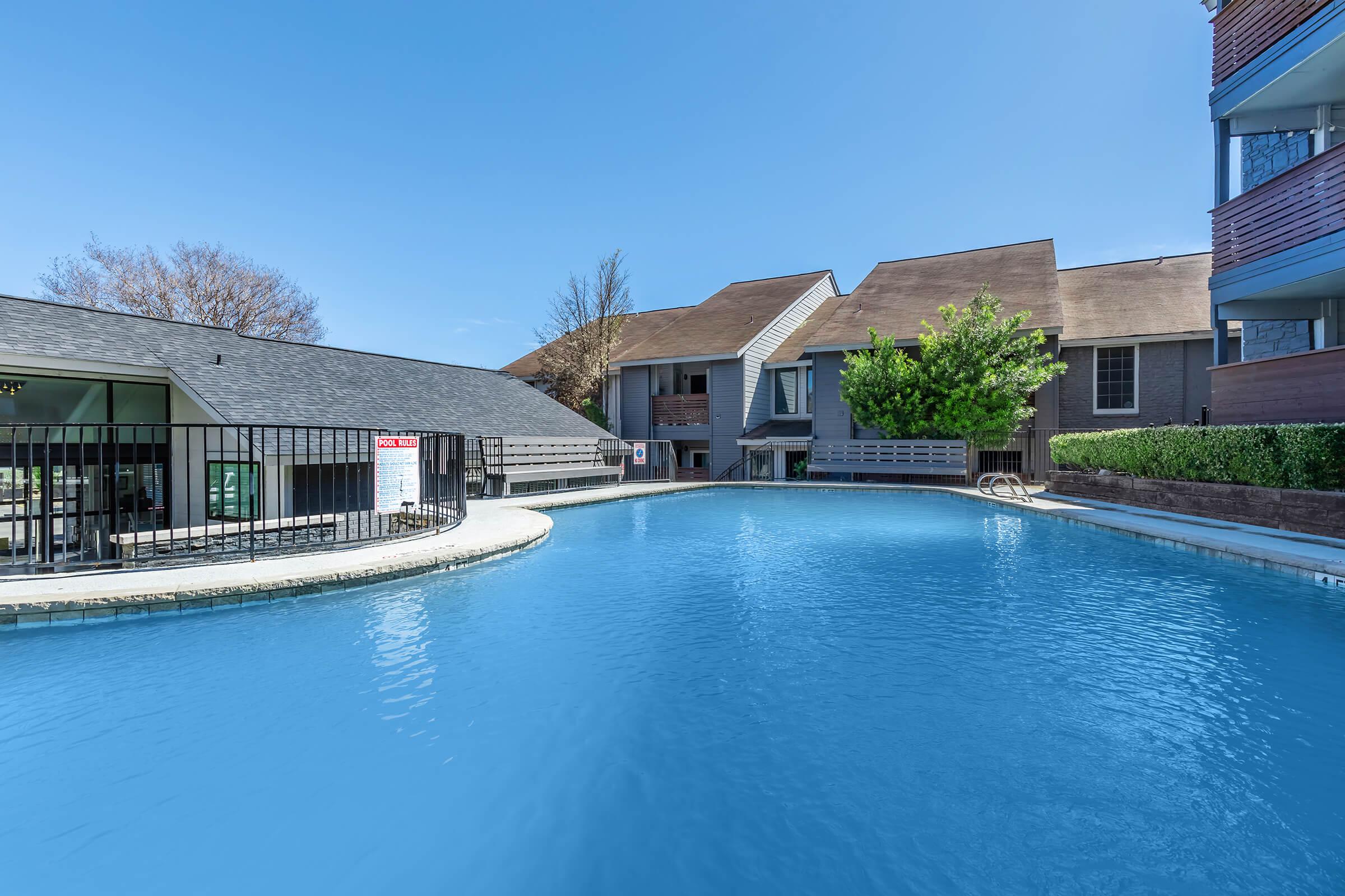 a house with a large pool of water