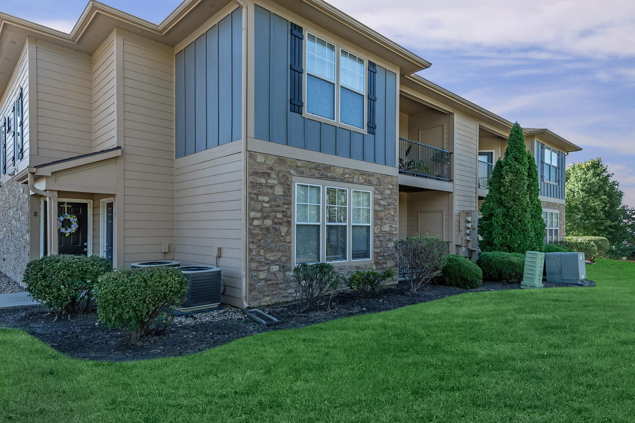 a large lawn in front of a house