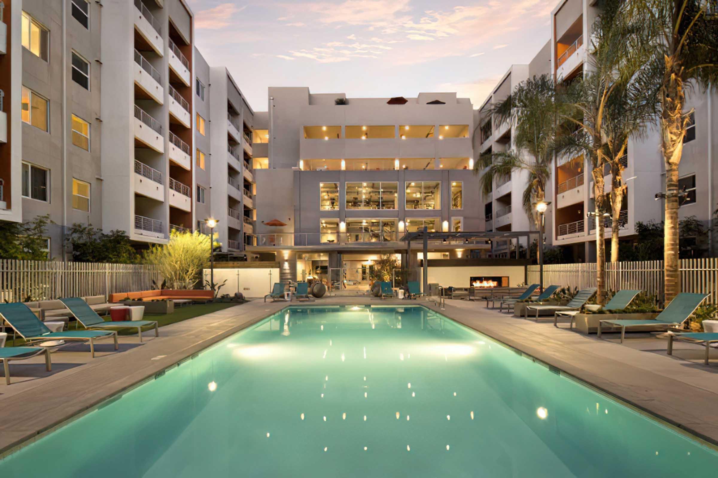 a view of a pool at dusk