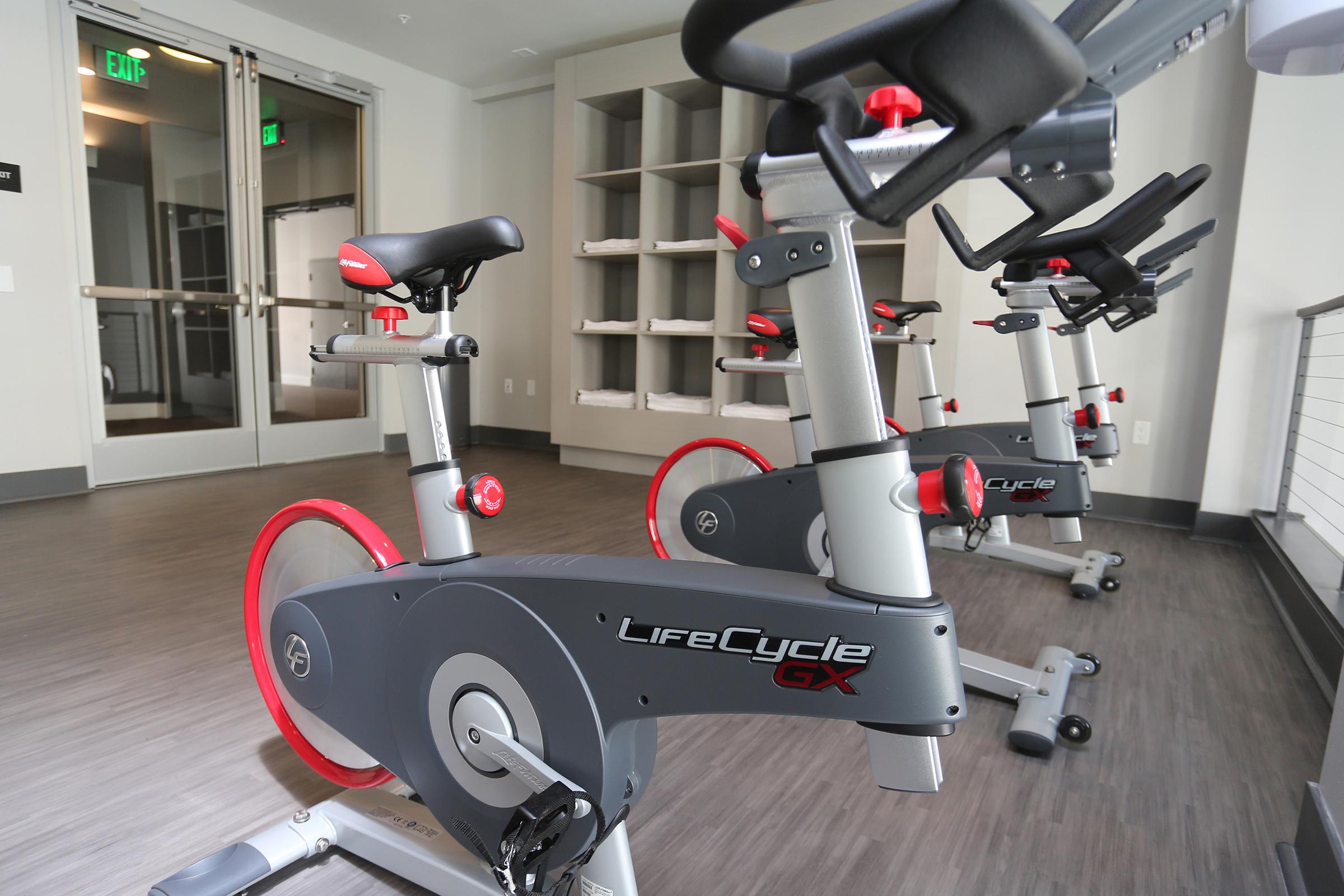 a row of exercise bikes