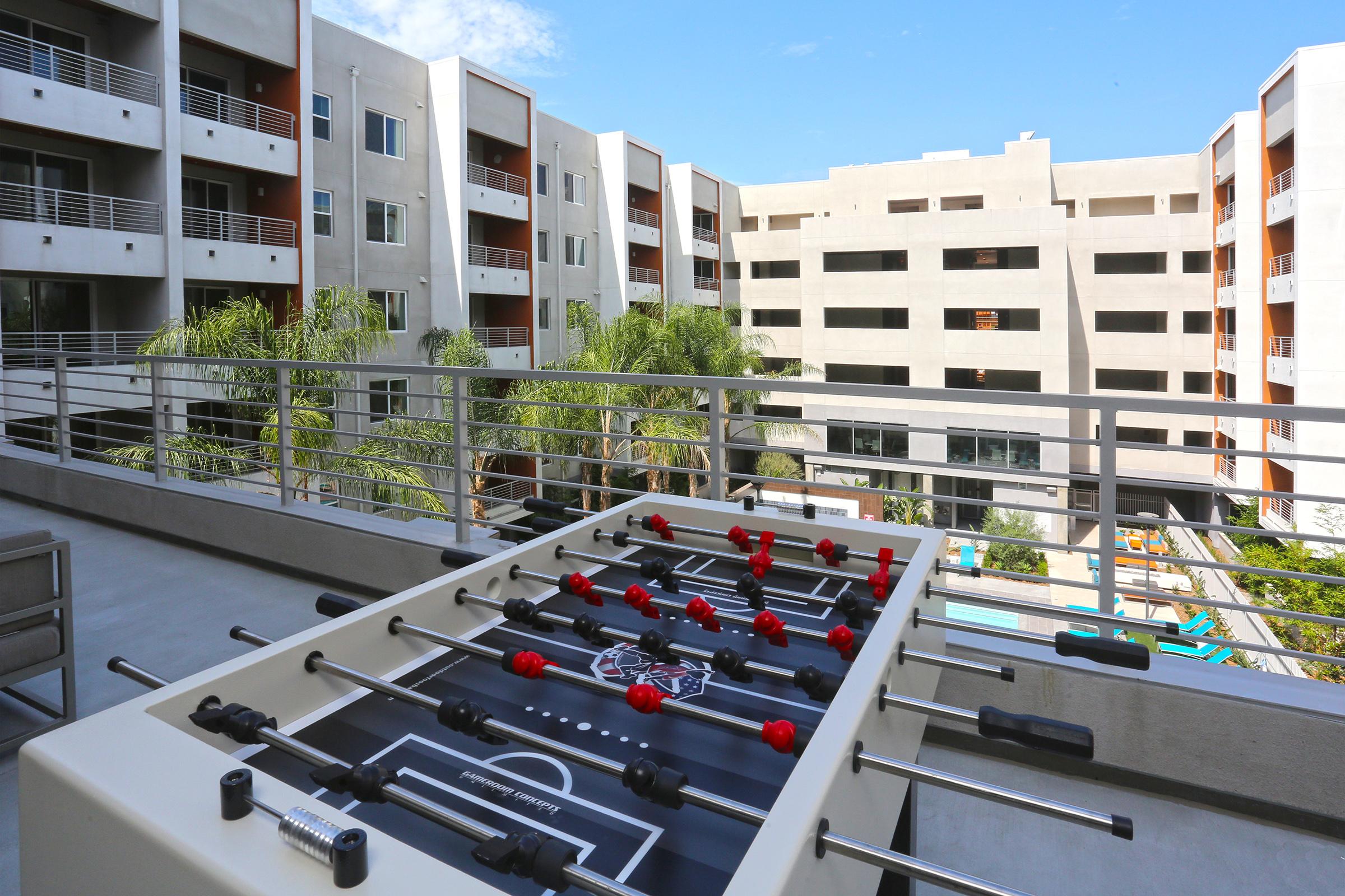 a foosball table on a patio