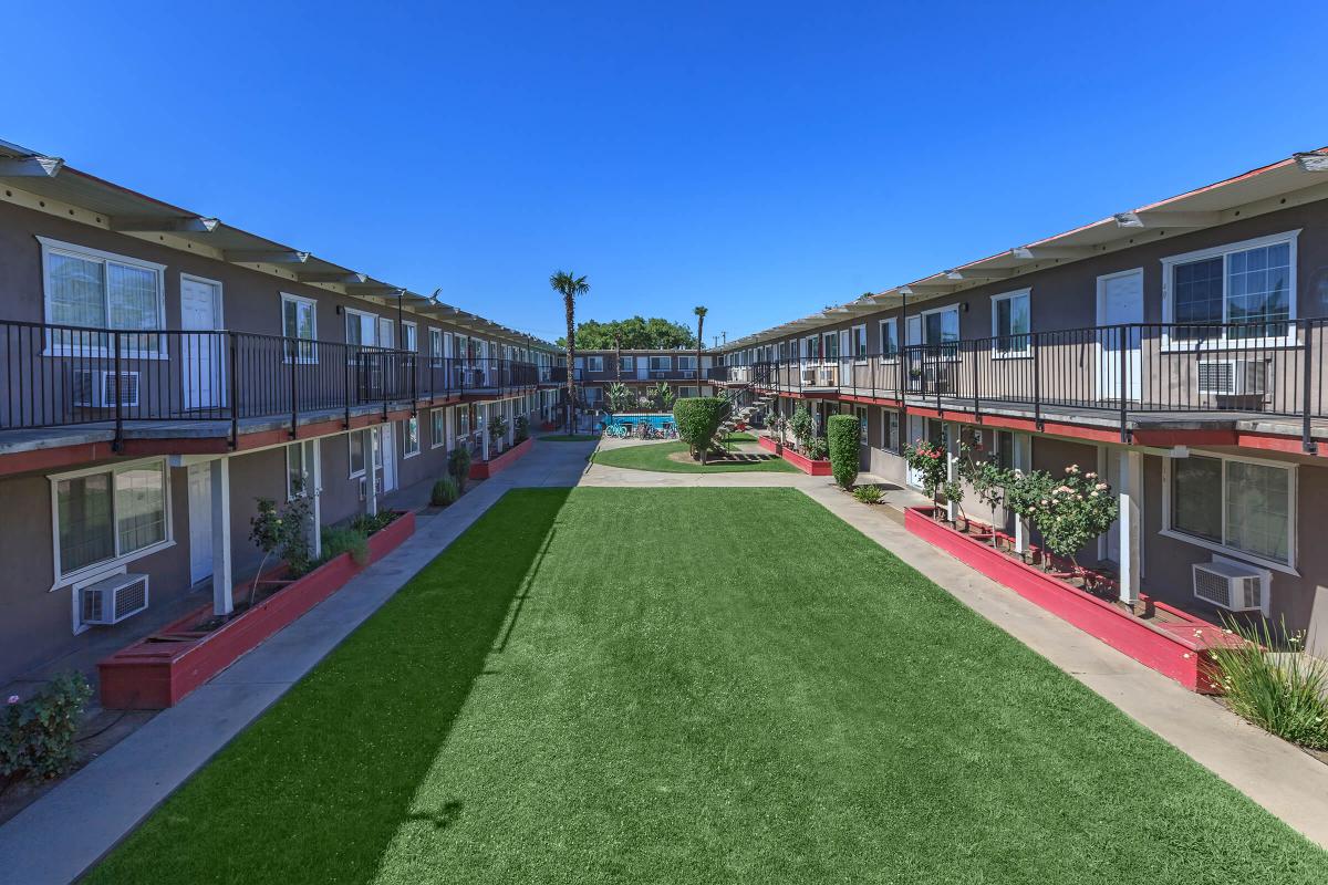 a large lawn in front of a building