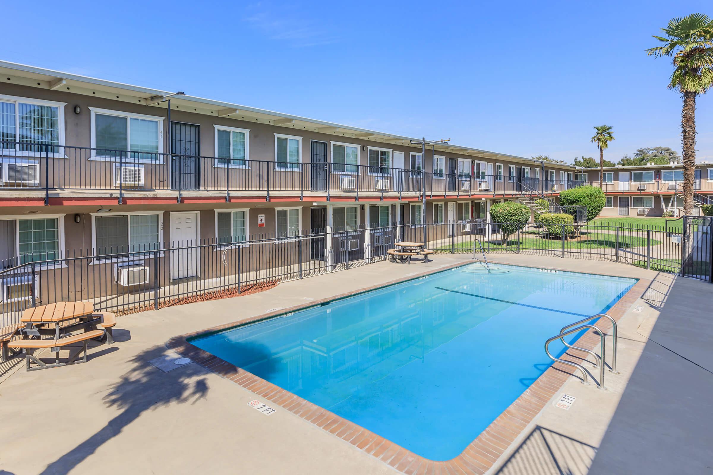 a pool next to a building