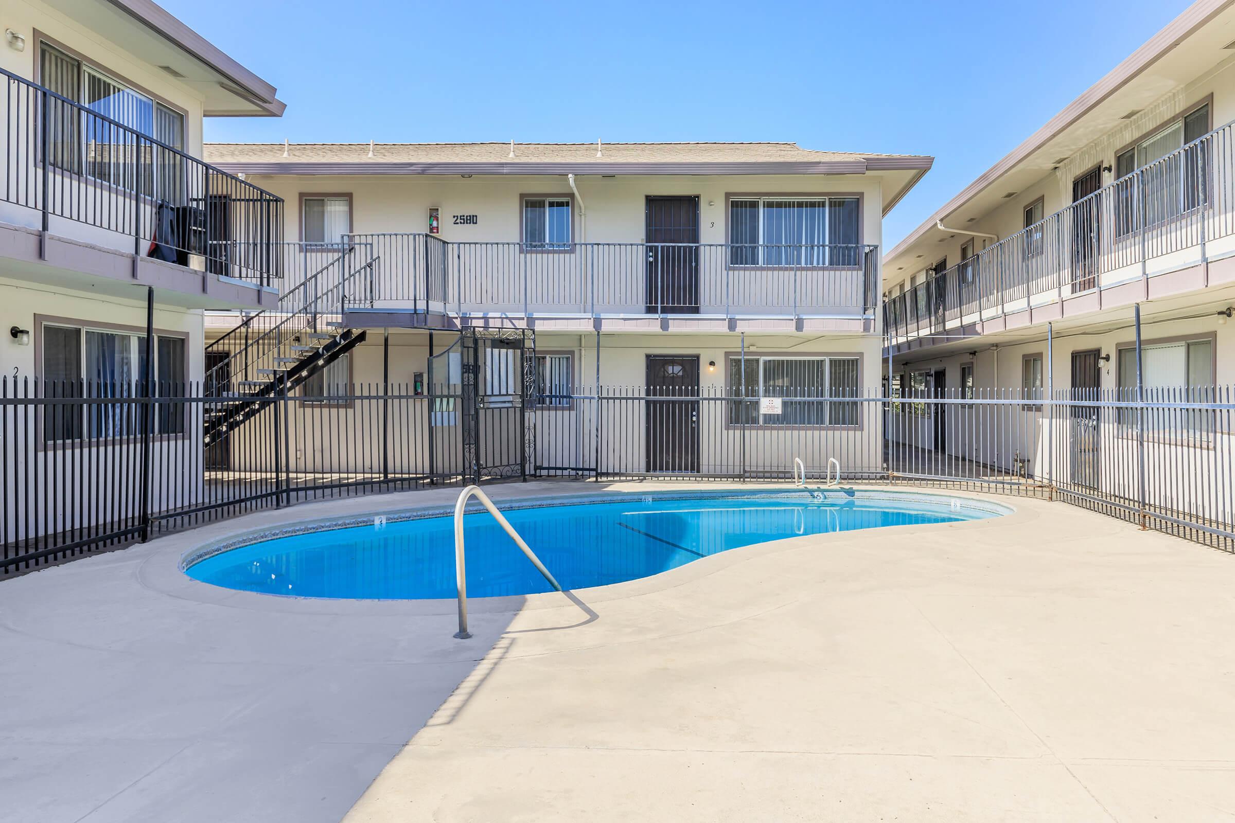 a pool next to a building