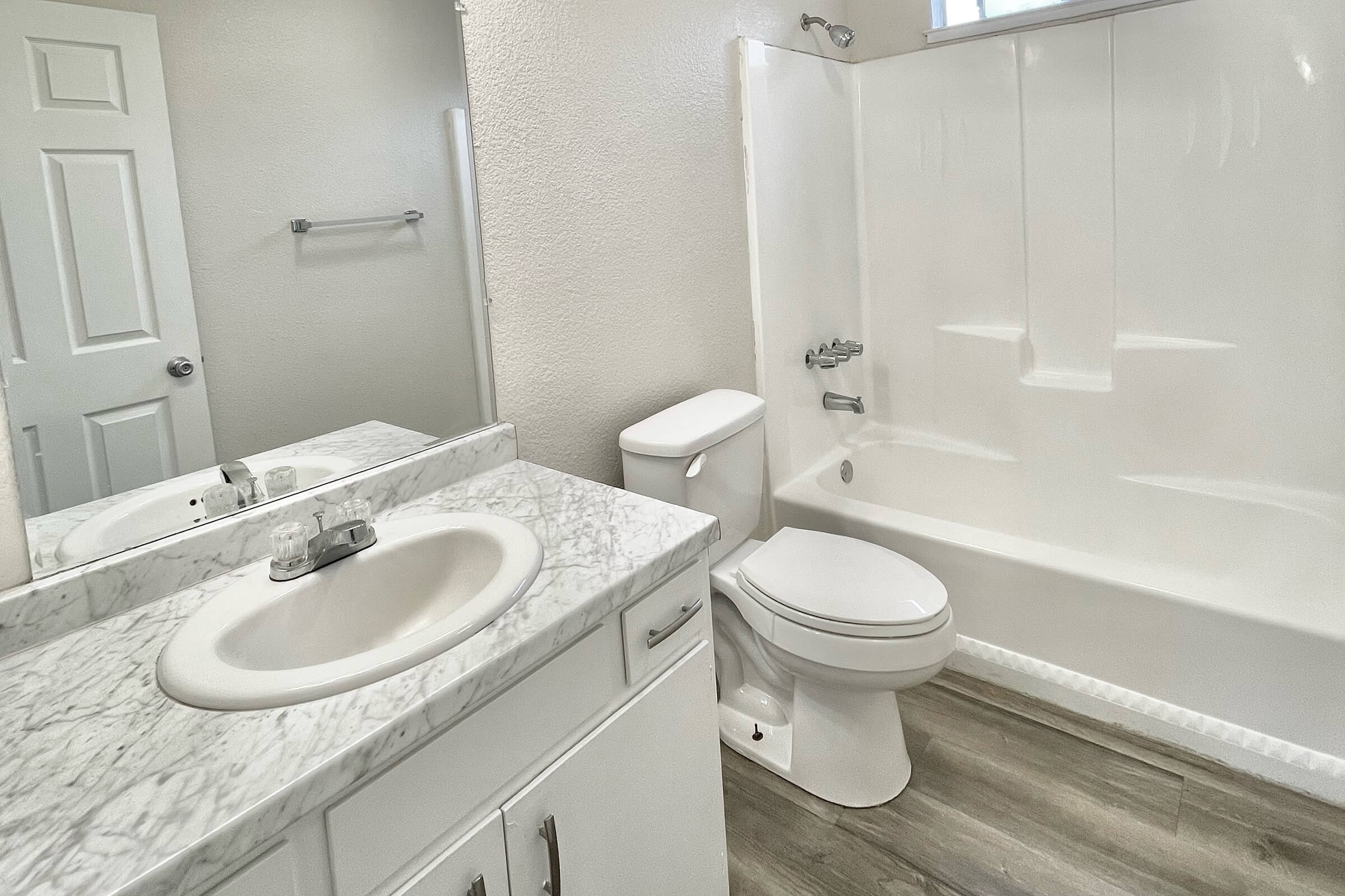 a close up of a sink and a mirror