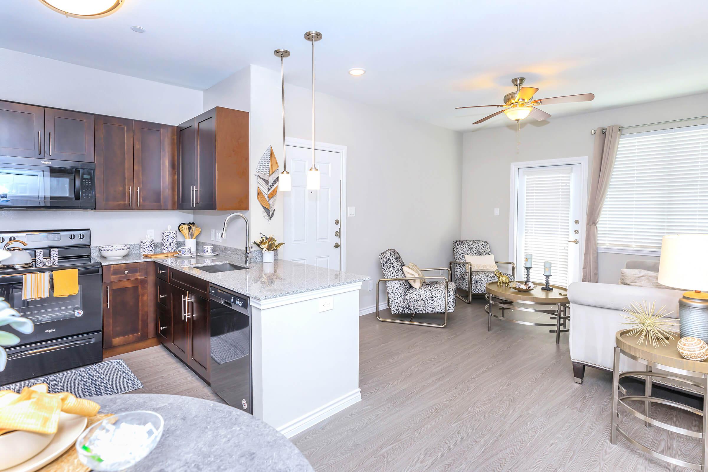 a kitchen with a table in a room