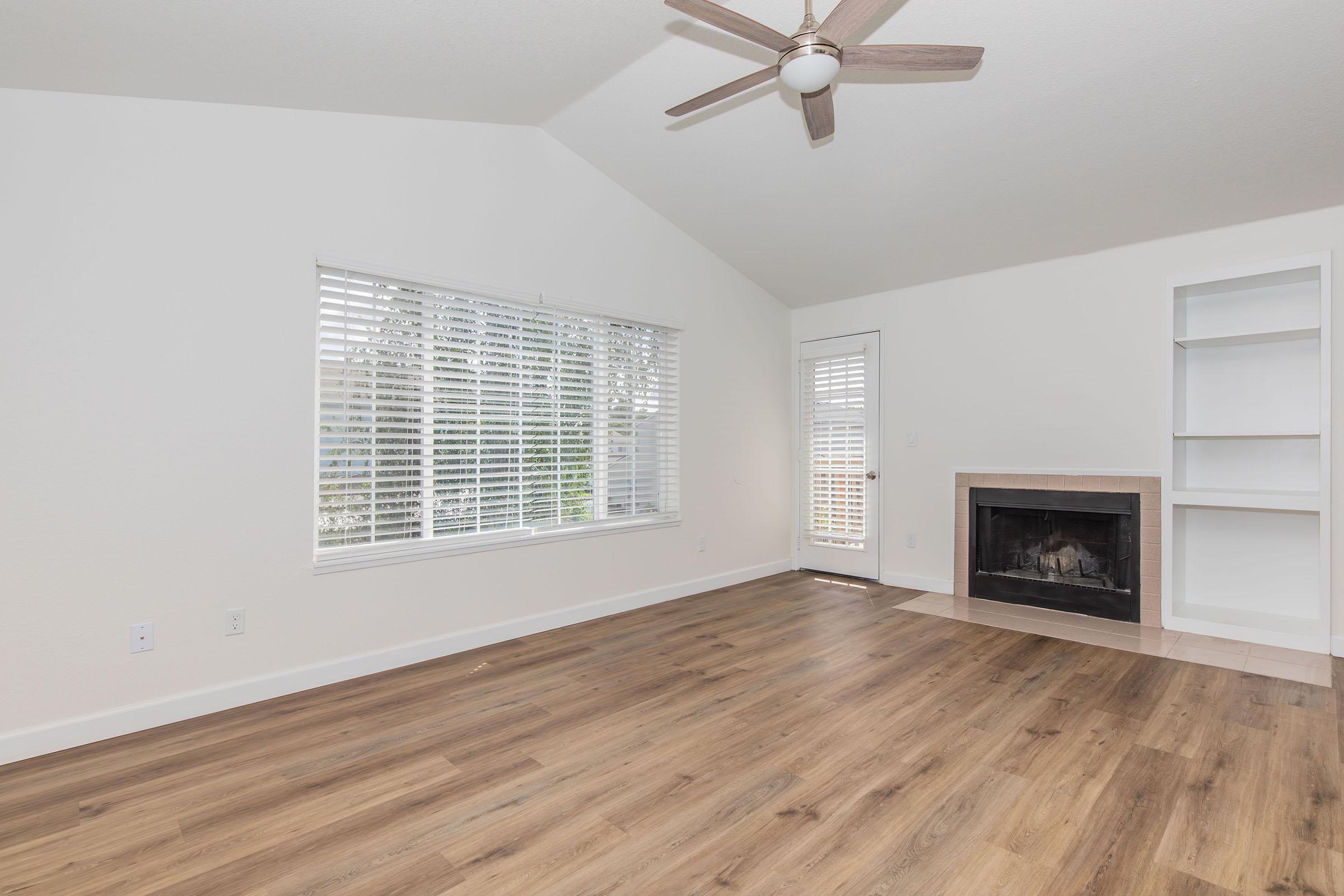 a living room with a wood floor