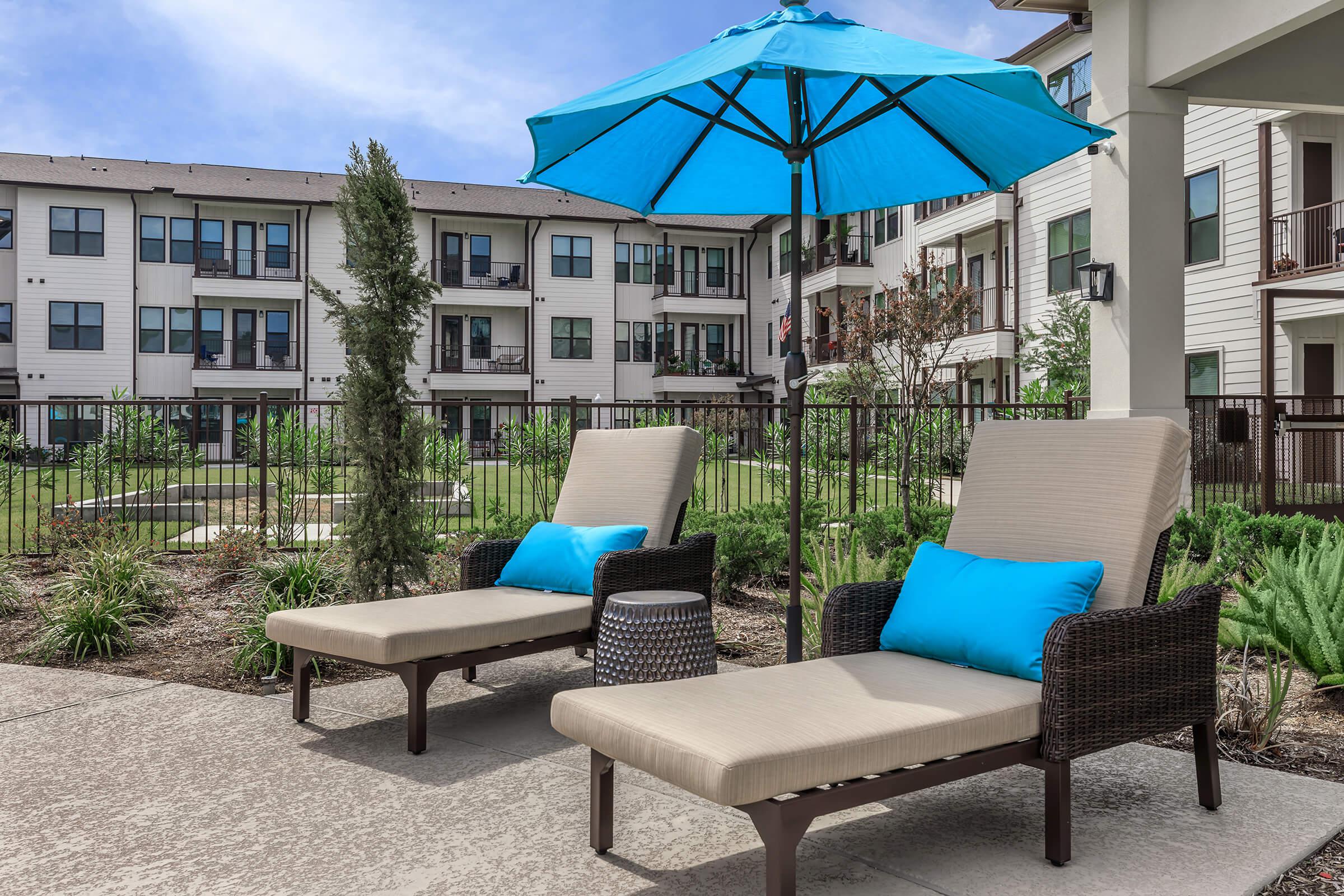 a couple of lawn chairs sitting on top of a table